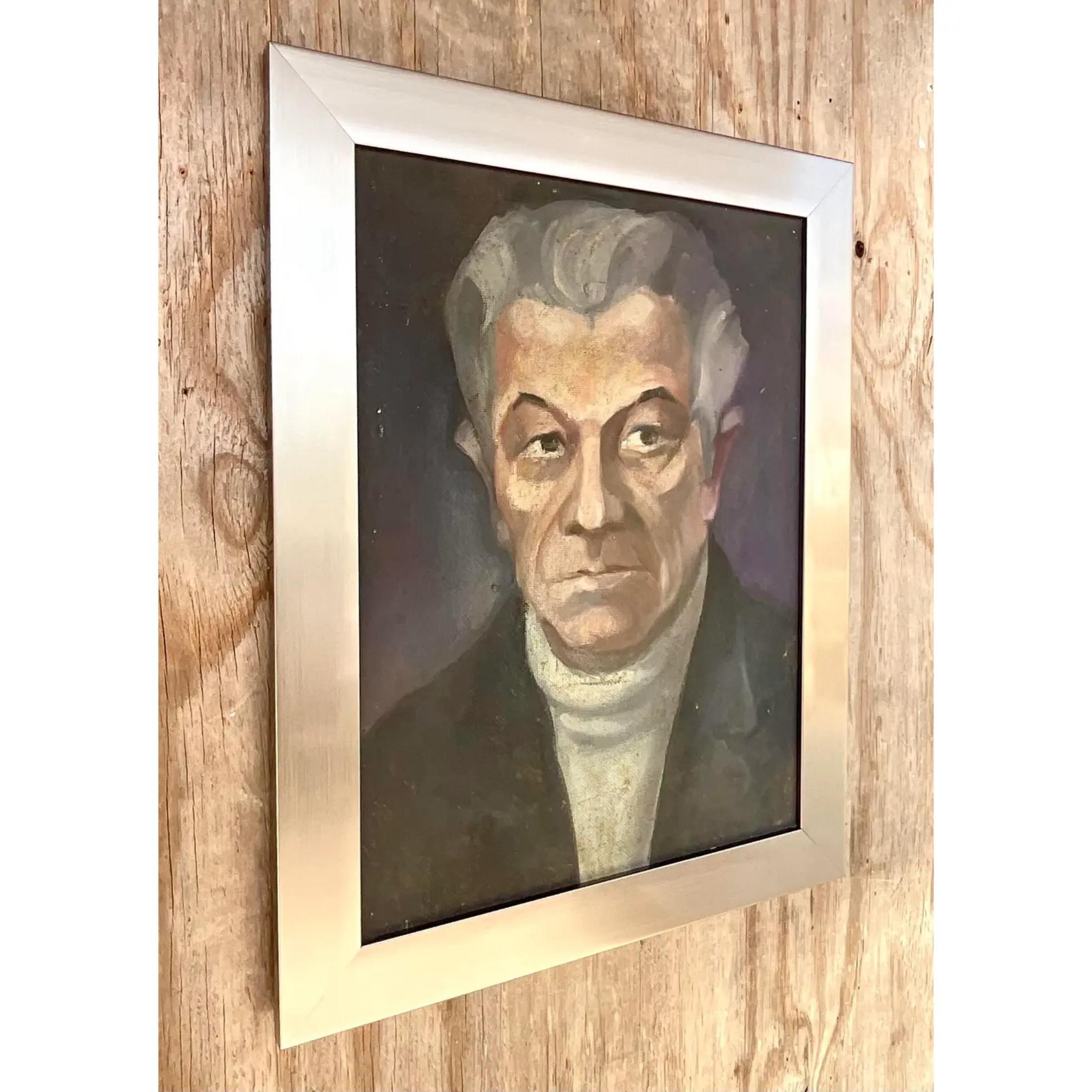 A fantastic vintage original oil portrait. A chic composition of a silver haired gentleman. Newly framed in a brushed silver wood frame. Unsigned. Acquired from a Palm Beach estate