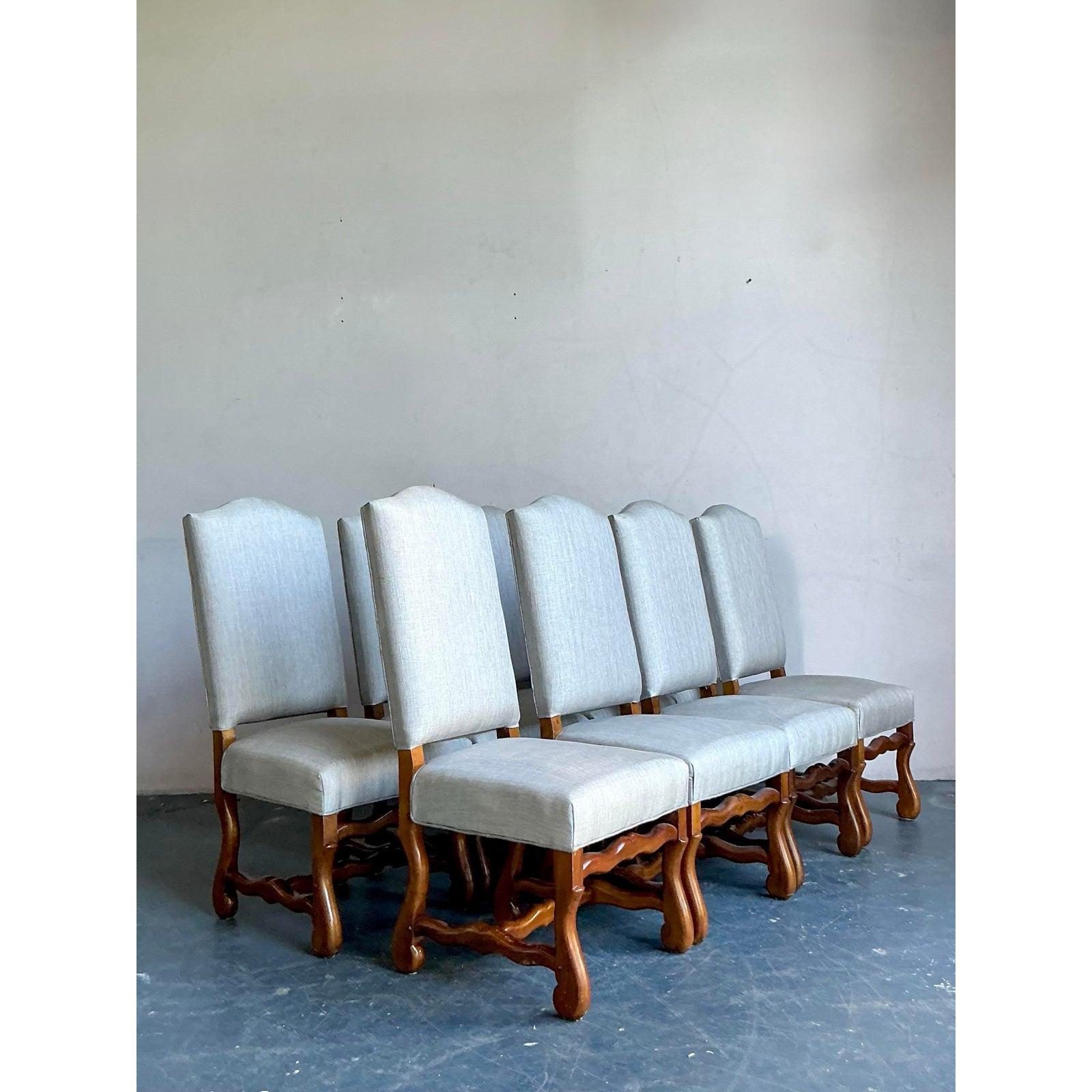 Presenting a superb set of eight vintage dining chairs, exquisitely crafted in the traditional French 