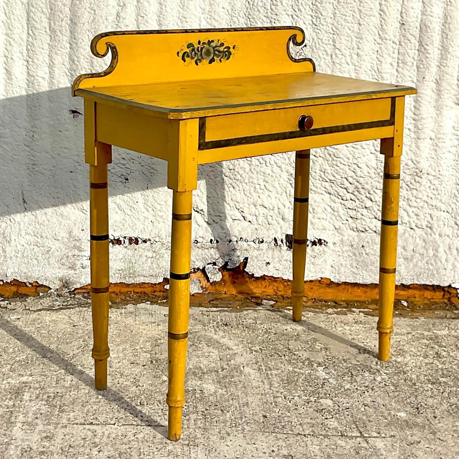 A fabulous vintage Boho rustic writing desk. Beautiful bright yellow with hand painted detail. Super charming. Acquired from a Palm Beach estate.