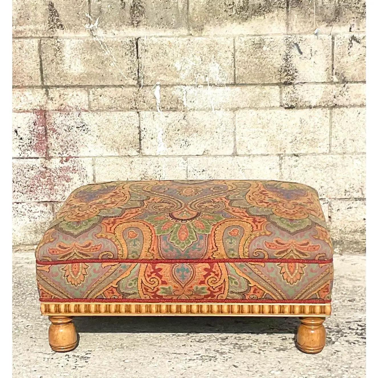 Fantastic vintage Paisley Jacquard ottoman. Beautiful ribbon trim along the bottom. Acquired from a Boca estate.