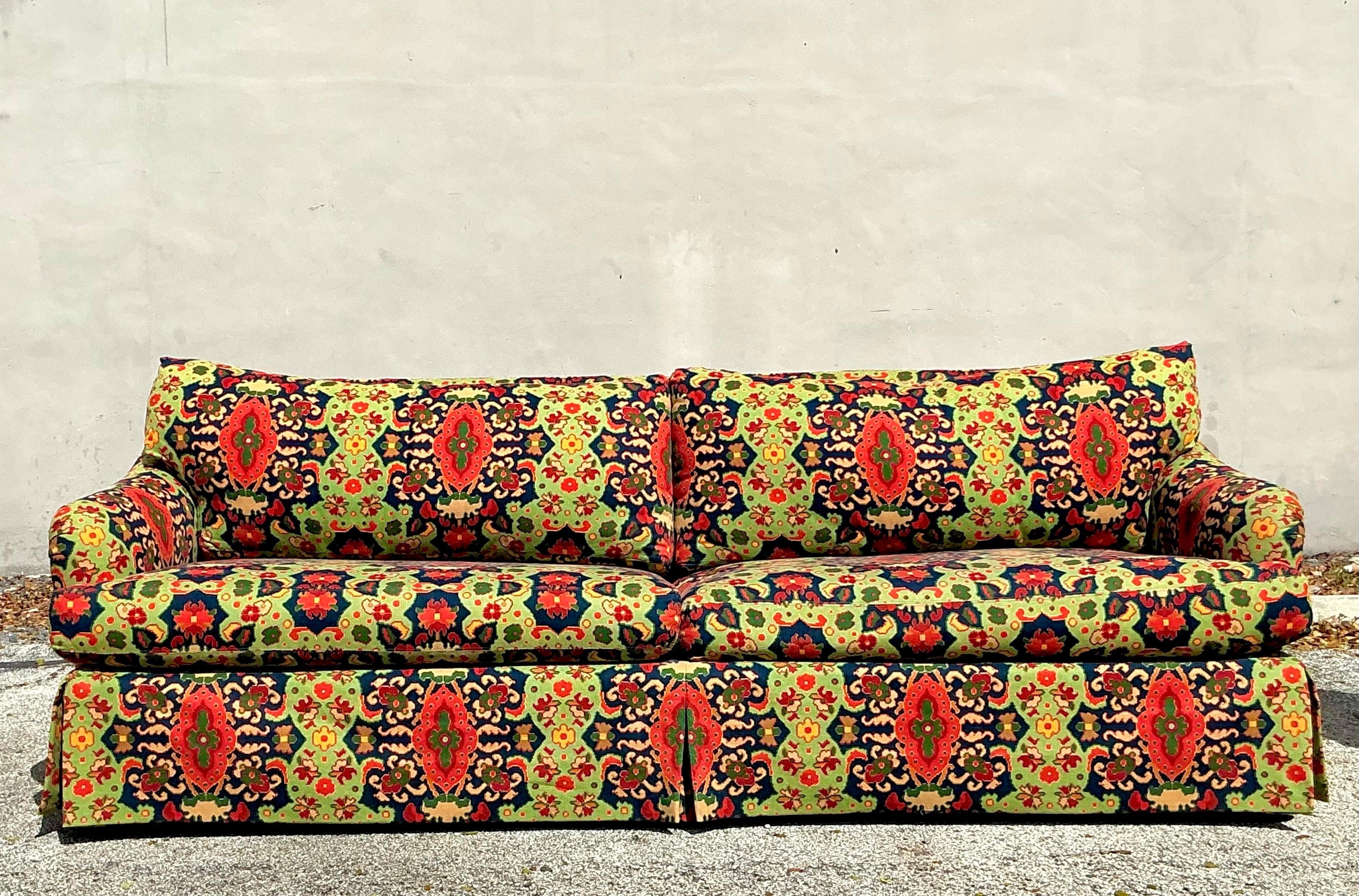 Introduce a statement of boho luxury to your living space with this Vintage Boho Paisley Printed Sofa. Draped in a rich paisley print, this sofa effortlessly combines vibrant color, intricate pattern, and a comfortable, inviting form. Perfect for