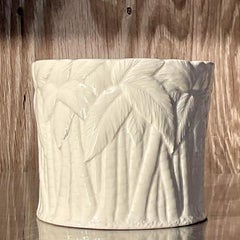 Cache pot in ceramica smaltata con rilievo di palma vintage con scimmia