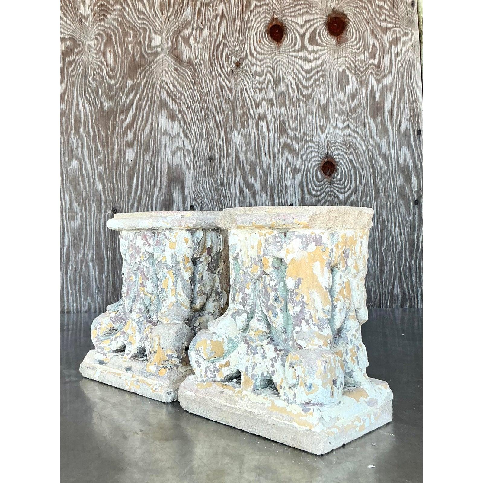 Introduce a touch of architectural history and artistic texture into your space with this pair of vintage cast concrete column fragments. These unique pieces possess a beautiful, time-worn patina that speaks of age and character, perfectly embodying
