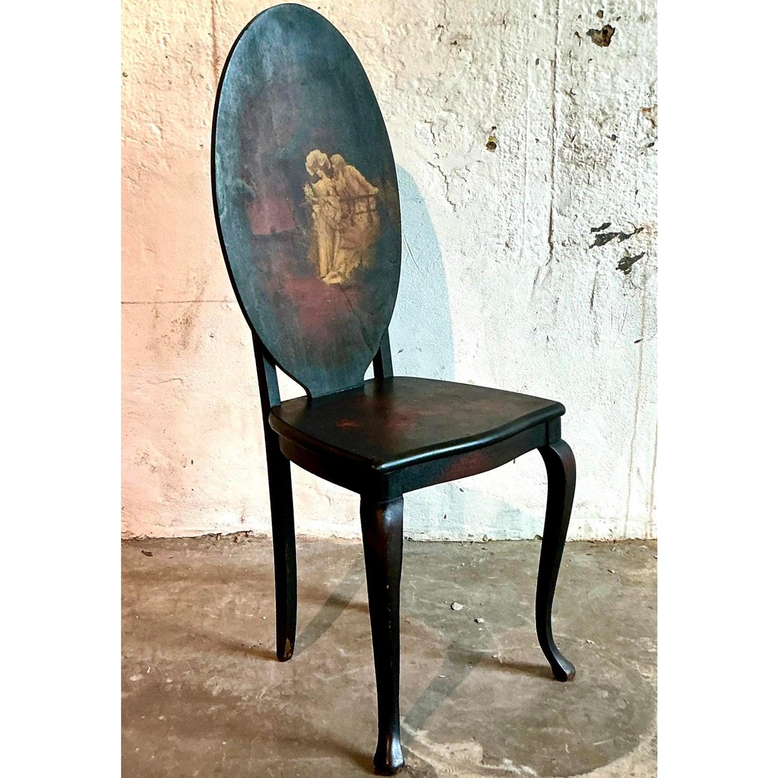 Overflowing with storybook charm, this antique slant-front desk is a captivating piece of functional art. Its elegant form, defined by graceful cabriole legs and a serpentine apron, is a hallmark of French Provincial design. The entire piece is