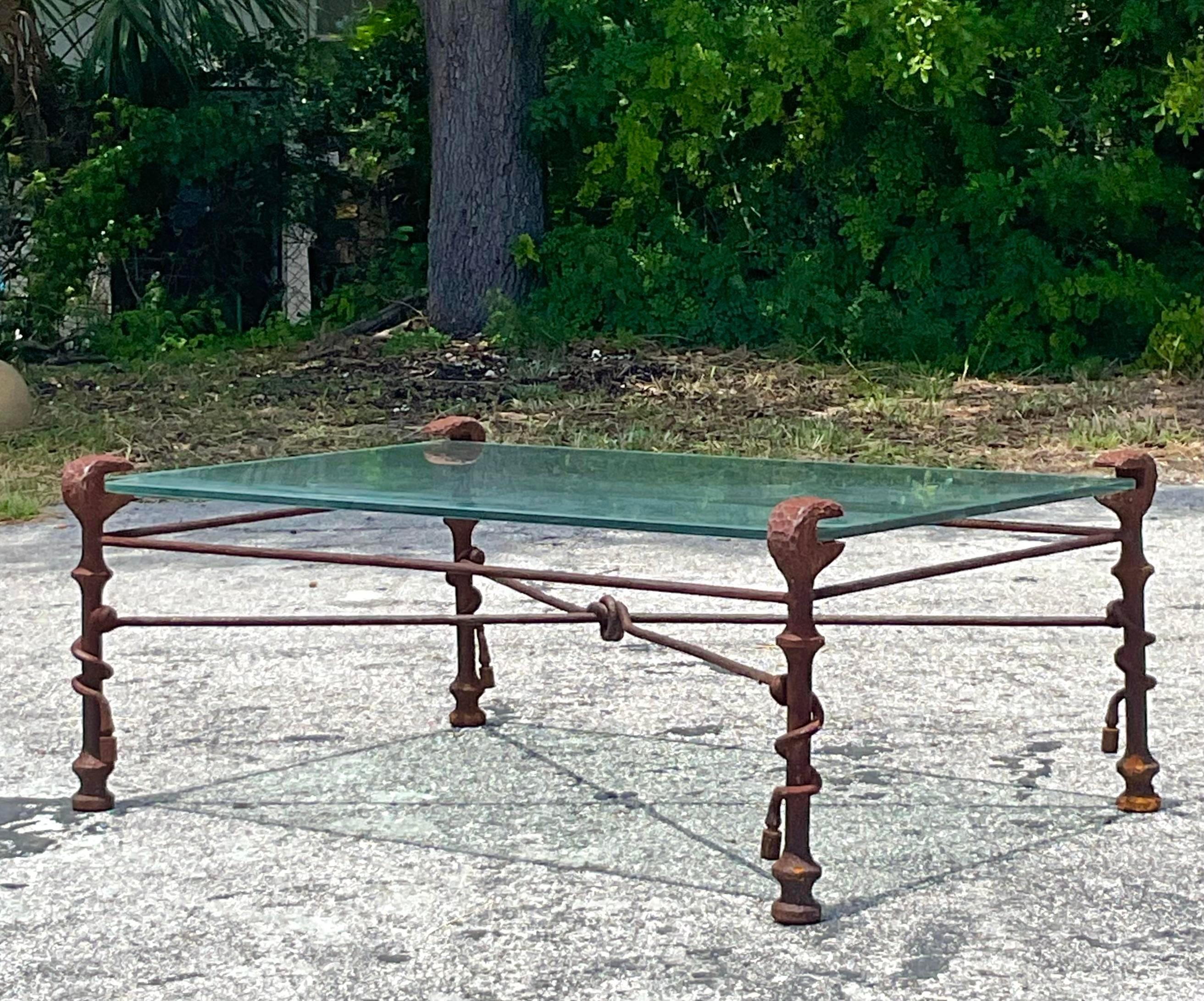 Elevate your living space with the artistic flair of this Vintage Boho Patinated Metal Coffee Table, inspired by Giacometti. Perfect for American-style interiors, this unique piece features a beautifully patinated metal frame with sculptural details