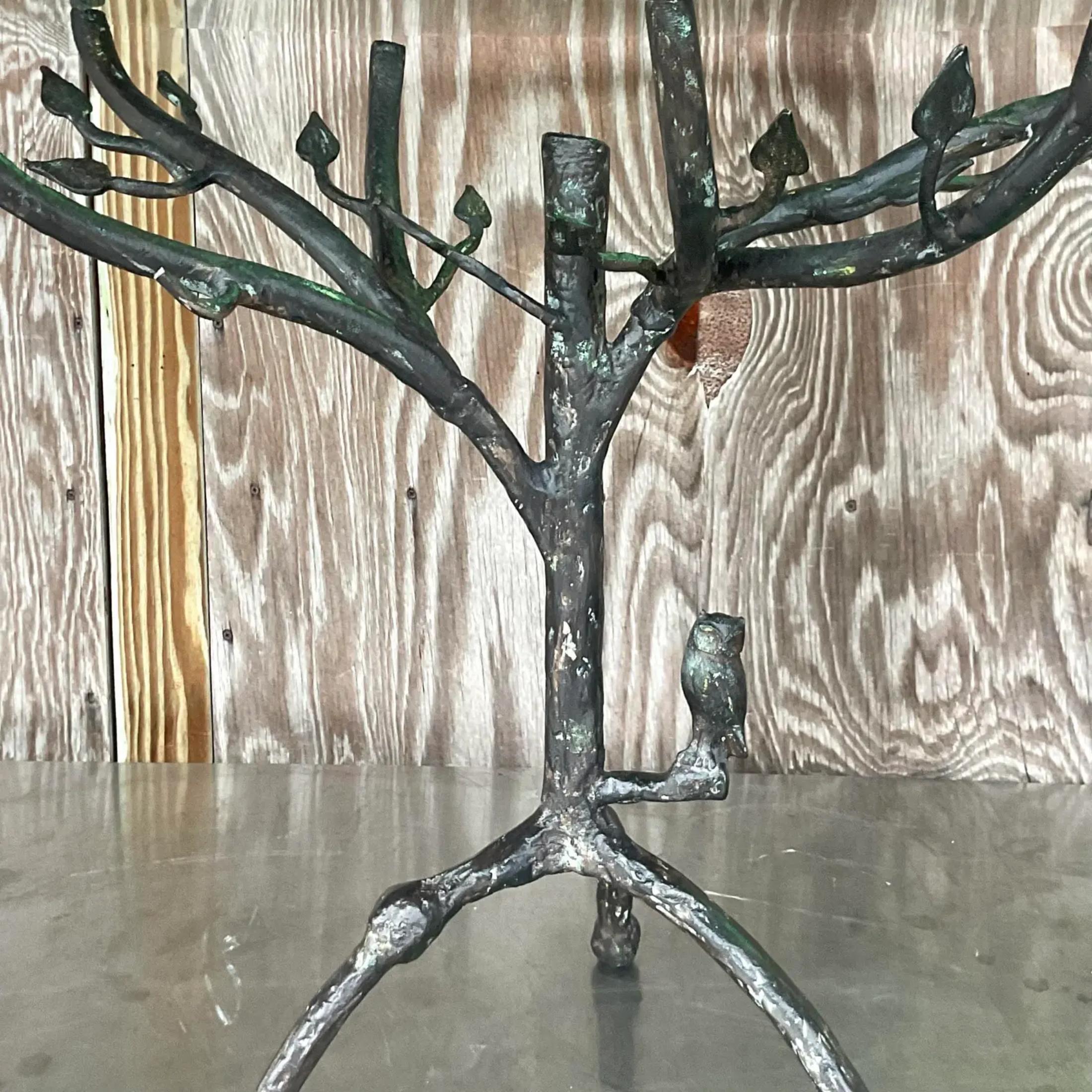 A fabulous vintage Boho side table. An amazing forged patinated metal pedestal done in the manner of Diego Giacometti’s iconic “Arbred Au Hibou” design. Acquired from a Palm Beach estate