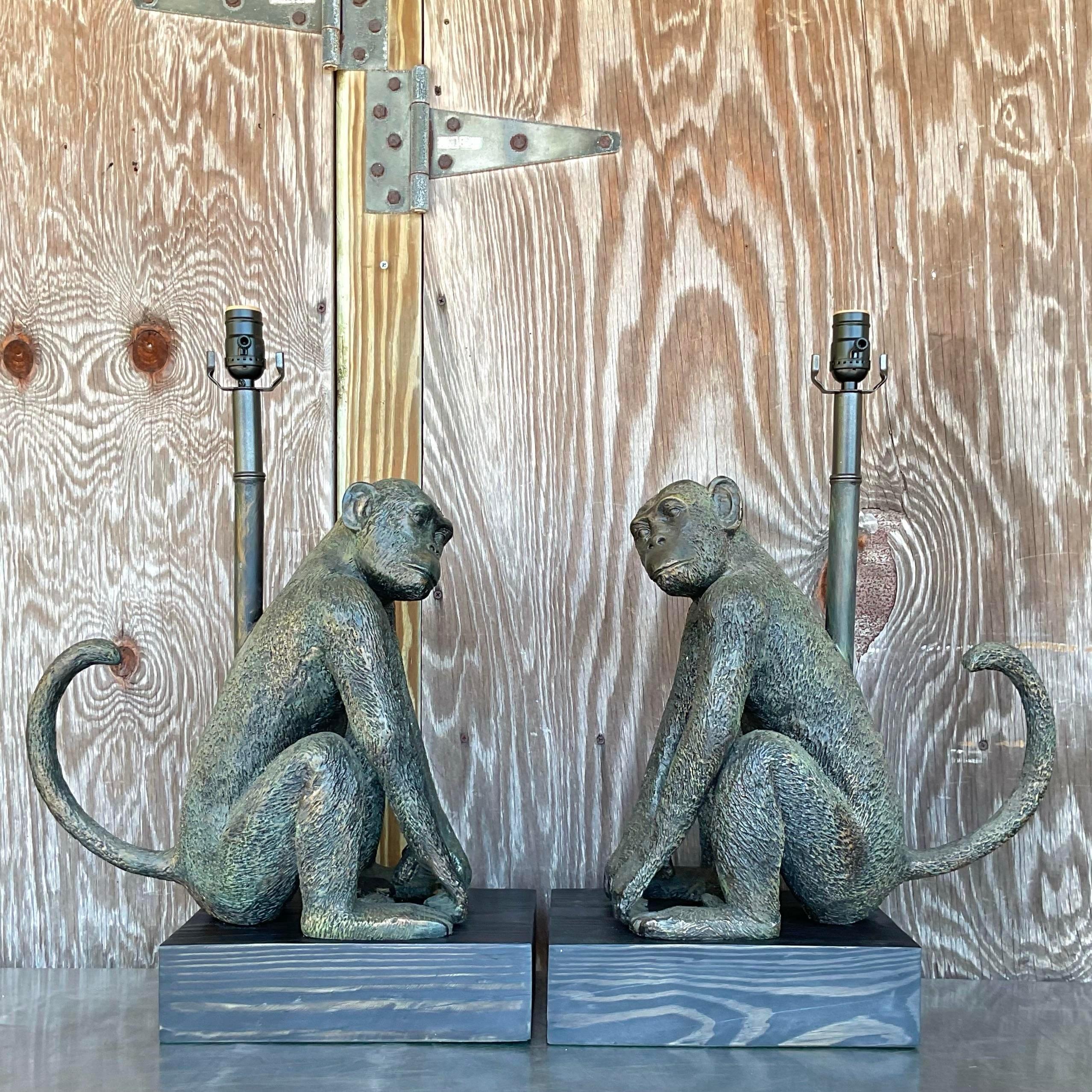 Illuminate your space with these vintage Boho monumental monkey table lamps. American-crafted with a rich patina, these lamps blend playful charm with artistic flair, making them a striking addition to eclectic or bohemian-inspired interiors