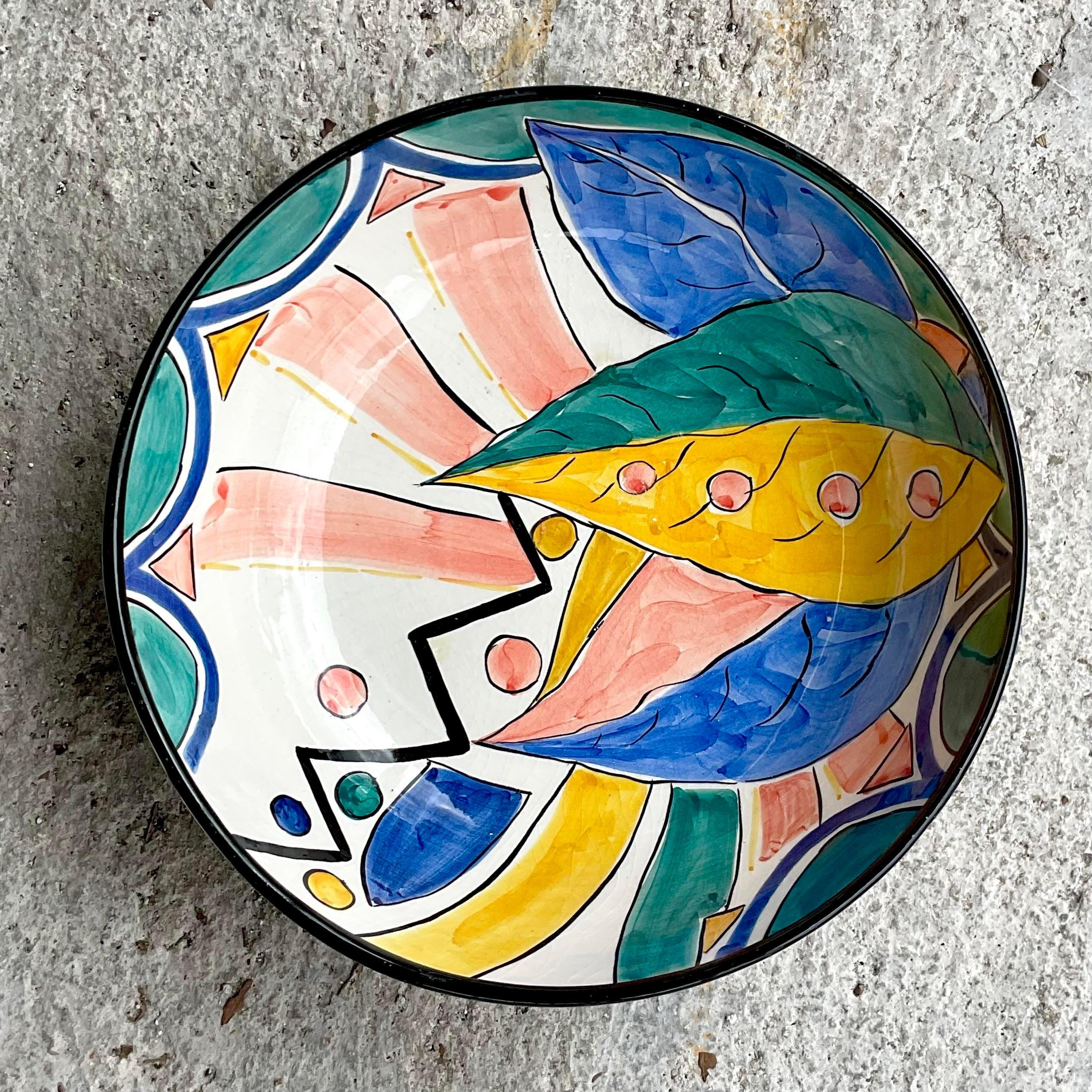A fabulous vintage Boho hand painted bowl. Made by the Pereiras group in Portugal and stamped on the bottom. Brilliant colors and a glazed ceramic finish. Acquired from a Palm Beach estate.