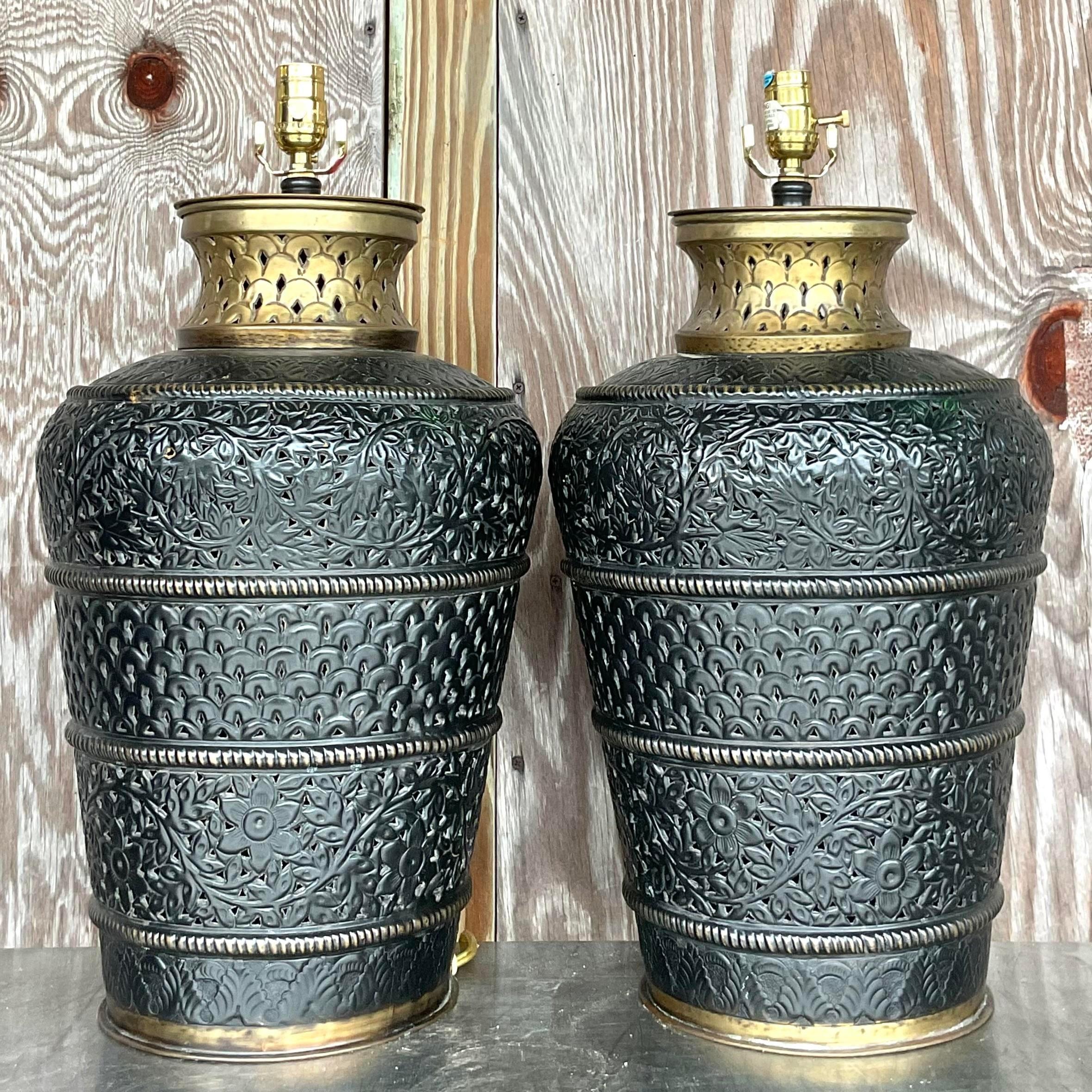 A striking pair of vintage Boho table lamps. Chic pierced metal in a brushed and burnished brass. Monumental in size and drama. Acquired from a Palm Beach estate. Up to 250V (Europe/UK Standard)