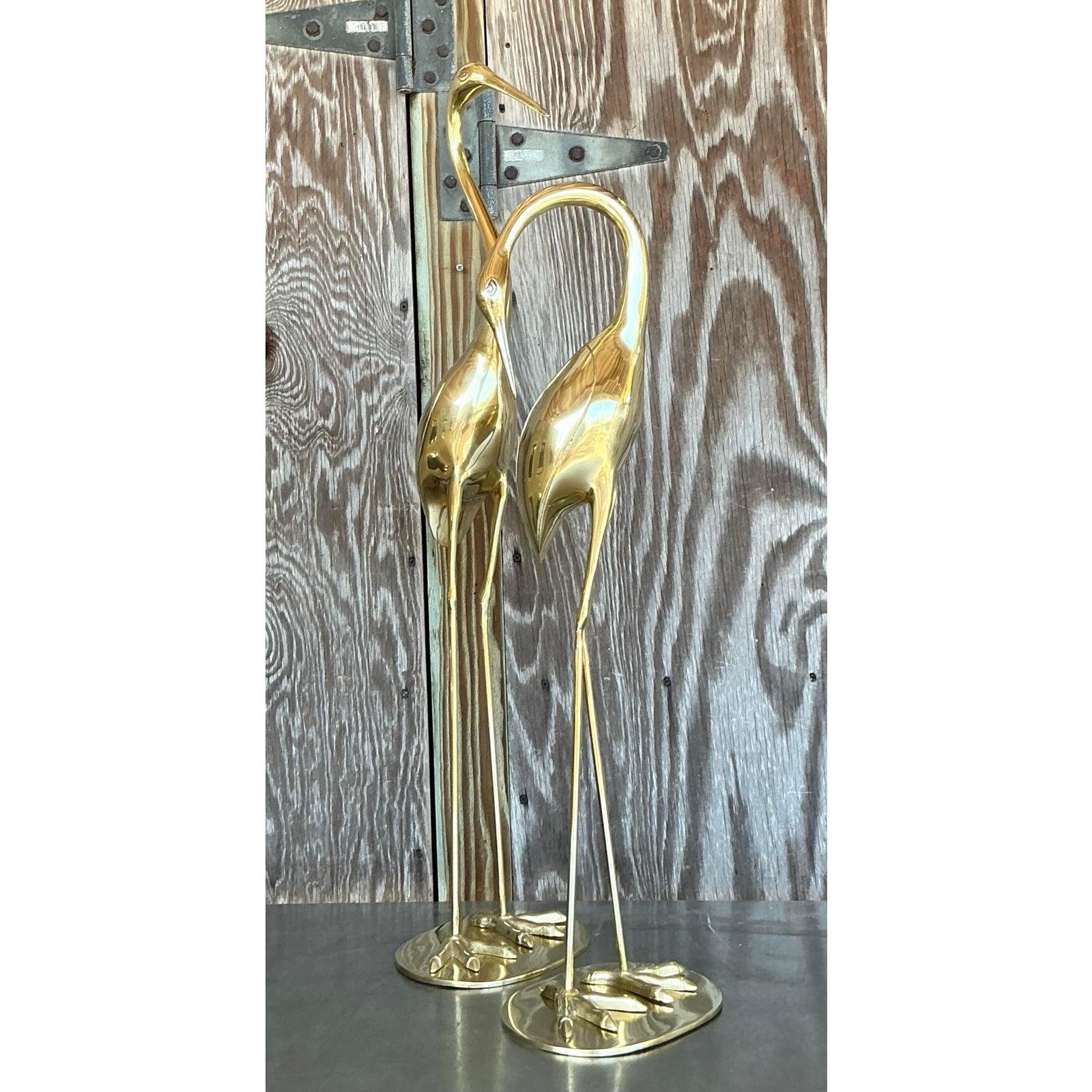 Vintage Boho Polished Brass Cranes- A Pair For Sale at 1stDibs