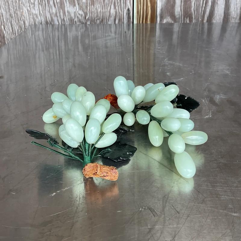 Vintage pair of Boho grape clusters. Beautiful polished stone in a pale green color. Acquired from a Palm Beach estate.