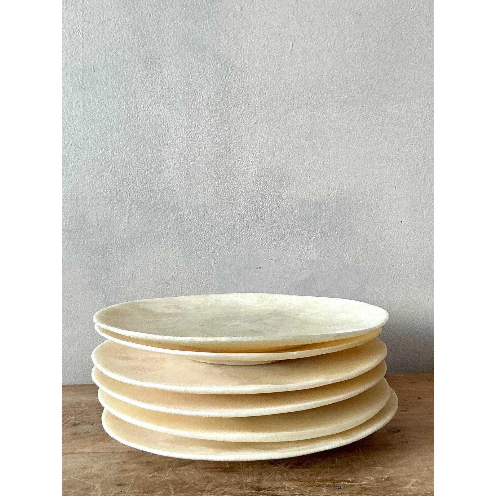Elevate your tablescape or wall decor with this exquisite set of six vintage poured resin plates, embodying a free-spirited Boho Chic aesthetic. Each plate features unique swirling patterns and an ethereal translucence, a testament to the