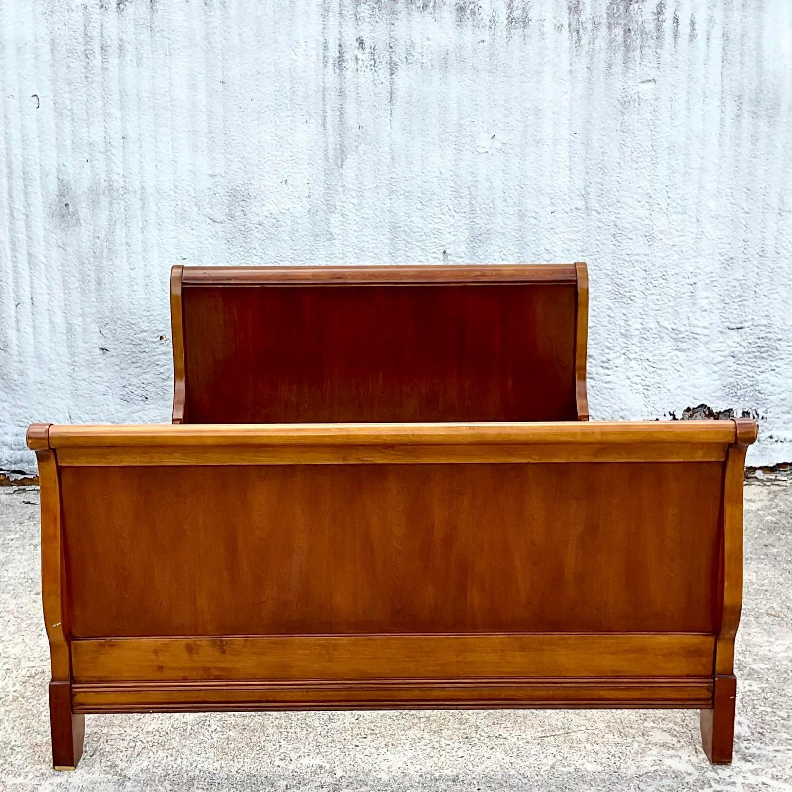 Gorgeous vintage Queen sleigh bed. Beautiful high sides and beautiful wood grain detail. Acquired from a Palm Beach estate.