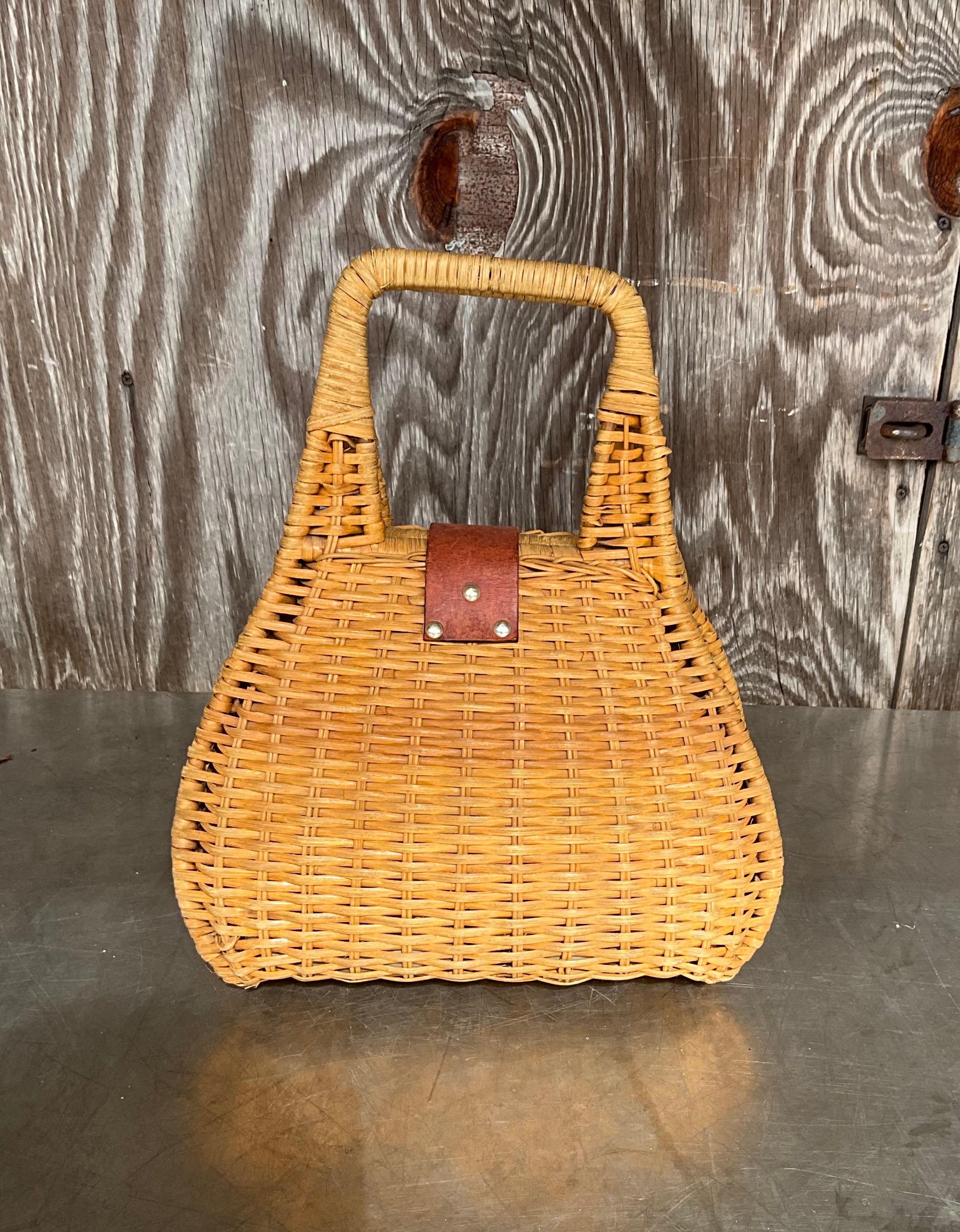 The Vintage Boho Rattan Handbag is a beautifully crafted, eco-friendly accessory that combines the natural elegance of woven rattan with the carefree, artistic spirit of boho fashion. Its earthy tones, intricate weaving, and lightweight design make