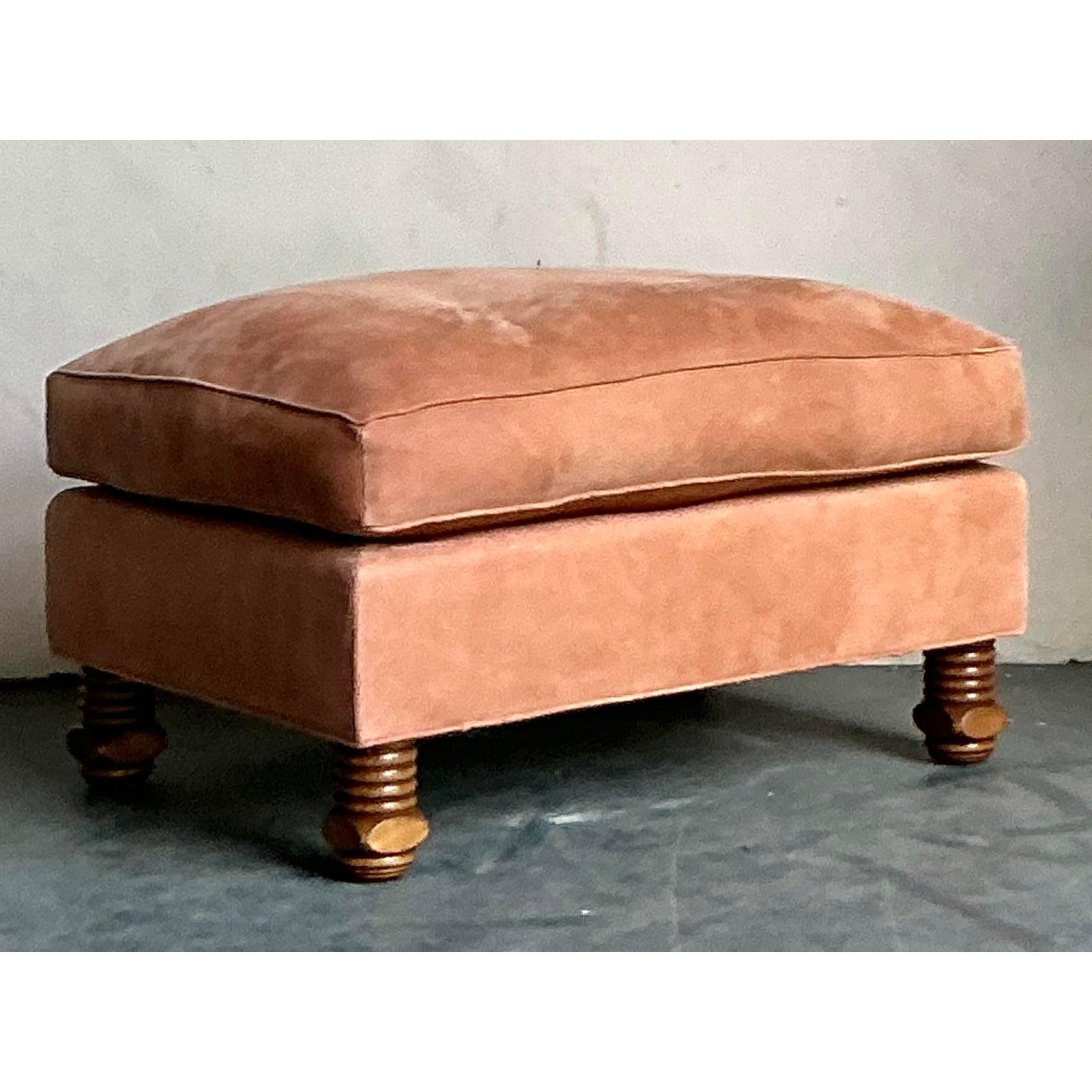 Complete your seating arrangement with this handsome and versatile vintage ottoman, designed in the sophisticated manner of Rose Tarlow. Echoing the Art Deco-inspired elegance of its matching club chairs, this piece features a plush, generously