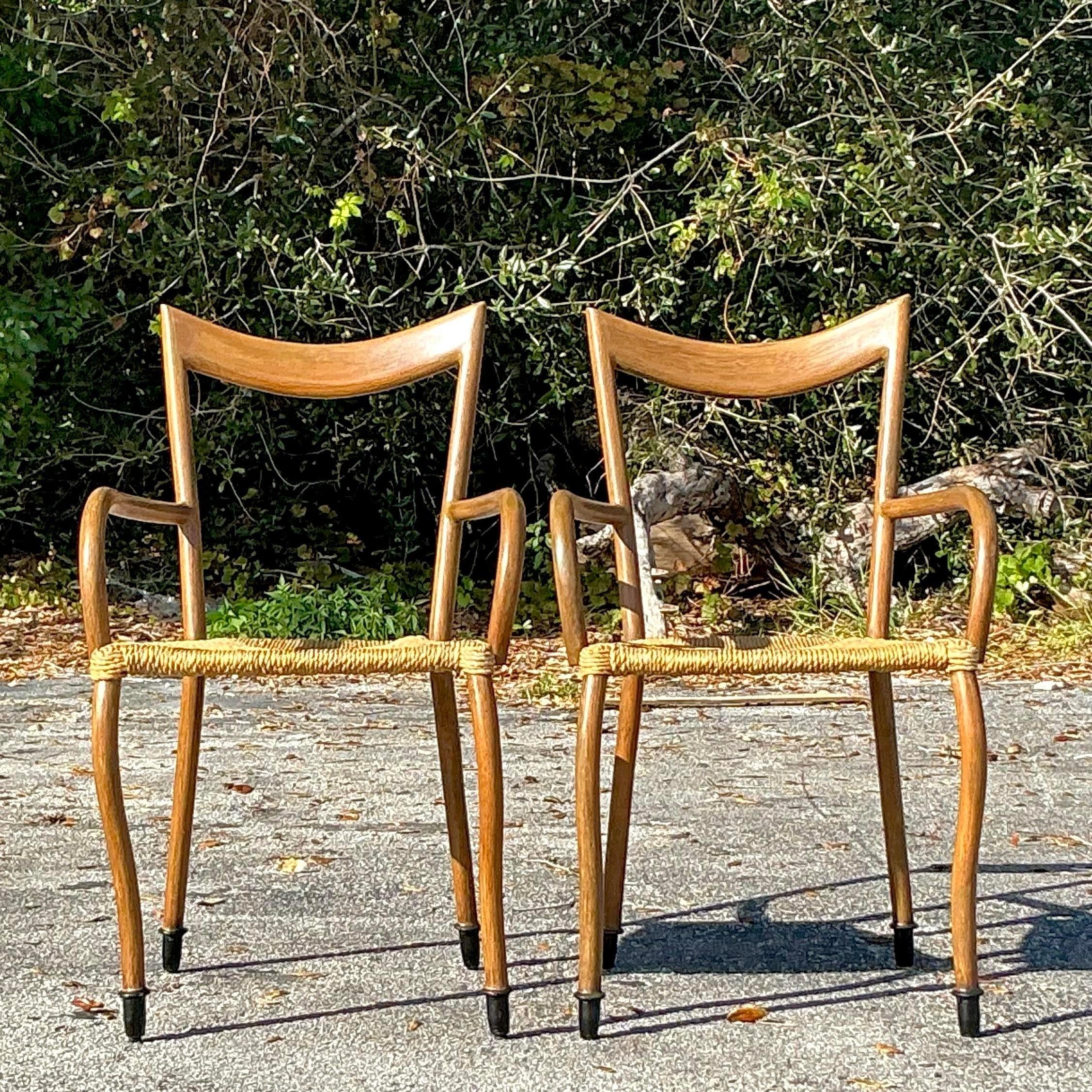 Américain Chaises à accoudoirs vintage Boho à siège en jonc - une paire en vente