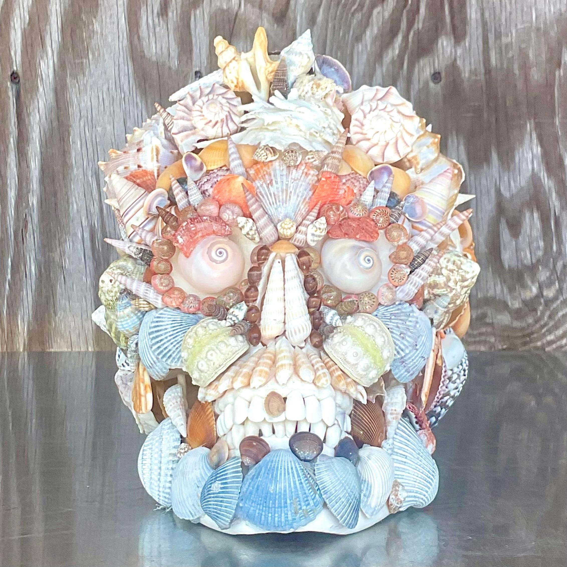 A fabulous vintage boho skull. Shell encrusted surface with incredible attention to detail. Signed by the artist. Acquired from a Palm Beach estate.
