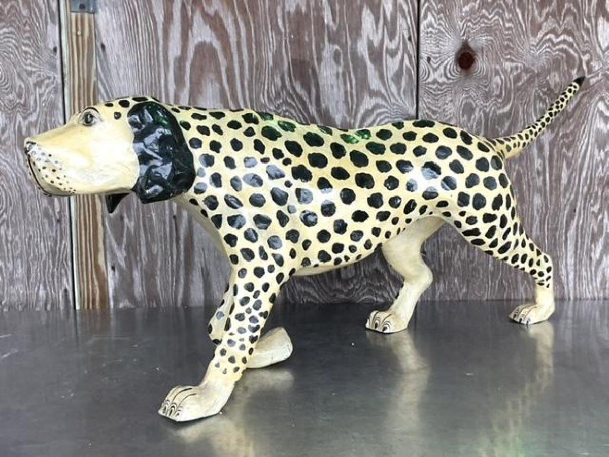 Capture the whimsy of vintage Boho Americana with this signed Bustamante paper mache dog. A charming blend of folk art and craftsmanship, this unique piece adds character and warmth to any eclectic home decor.