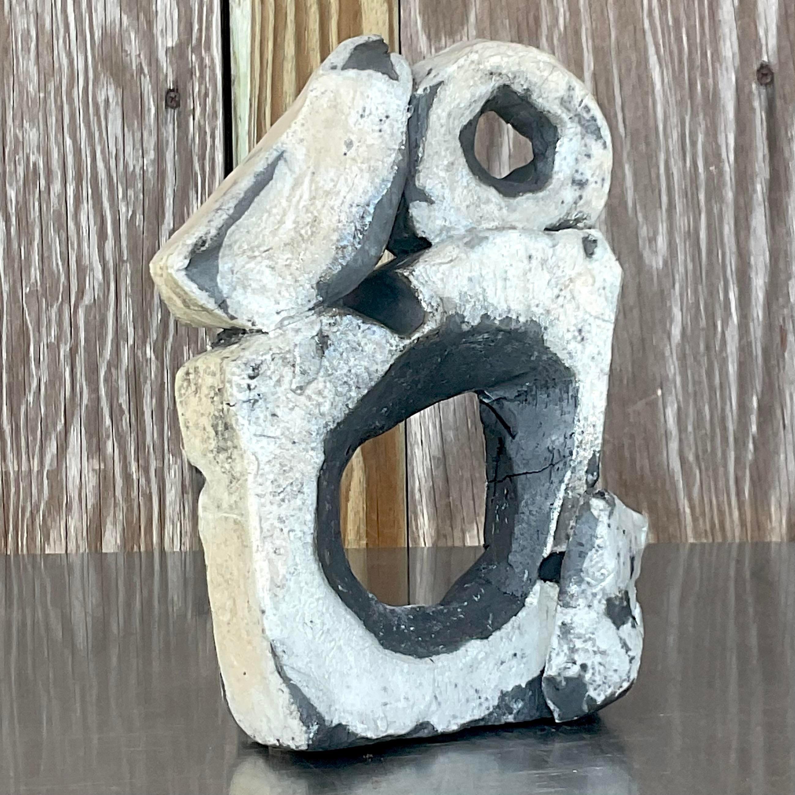 An exceptional vintage Boho ceramic sculpture. A chic Abstract composition with a graphic black and white scorched finish. Stamped by the artist C. Heck. Acquired from a Palm Beach estate.