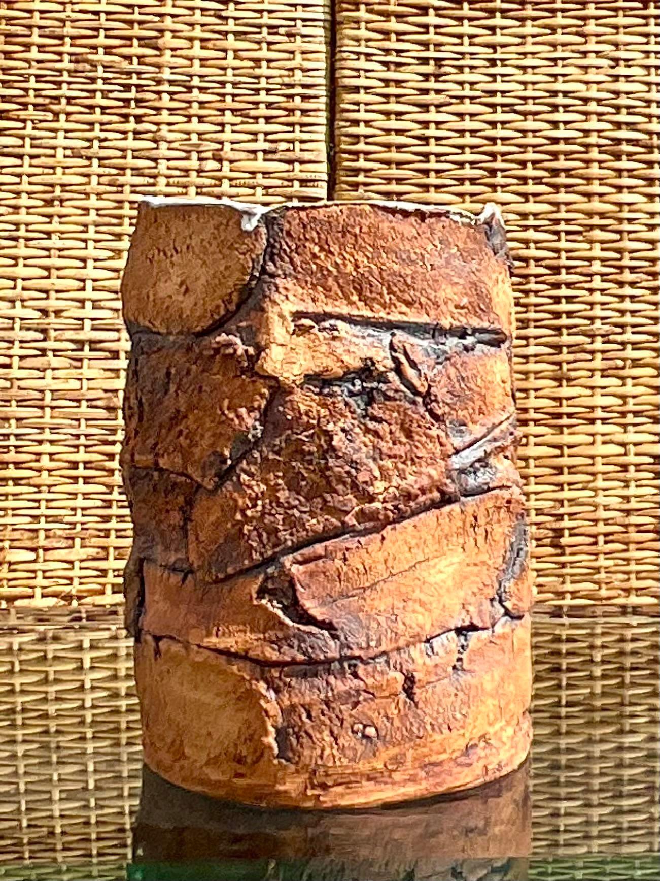 Vintage handmade pottery vase. Great textural detail with a glazed interior. Signed on the bottom. Acquired from a Palm Beach estate.