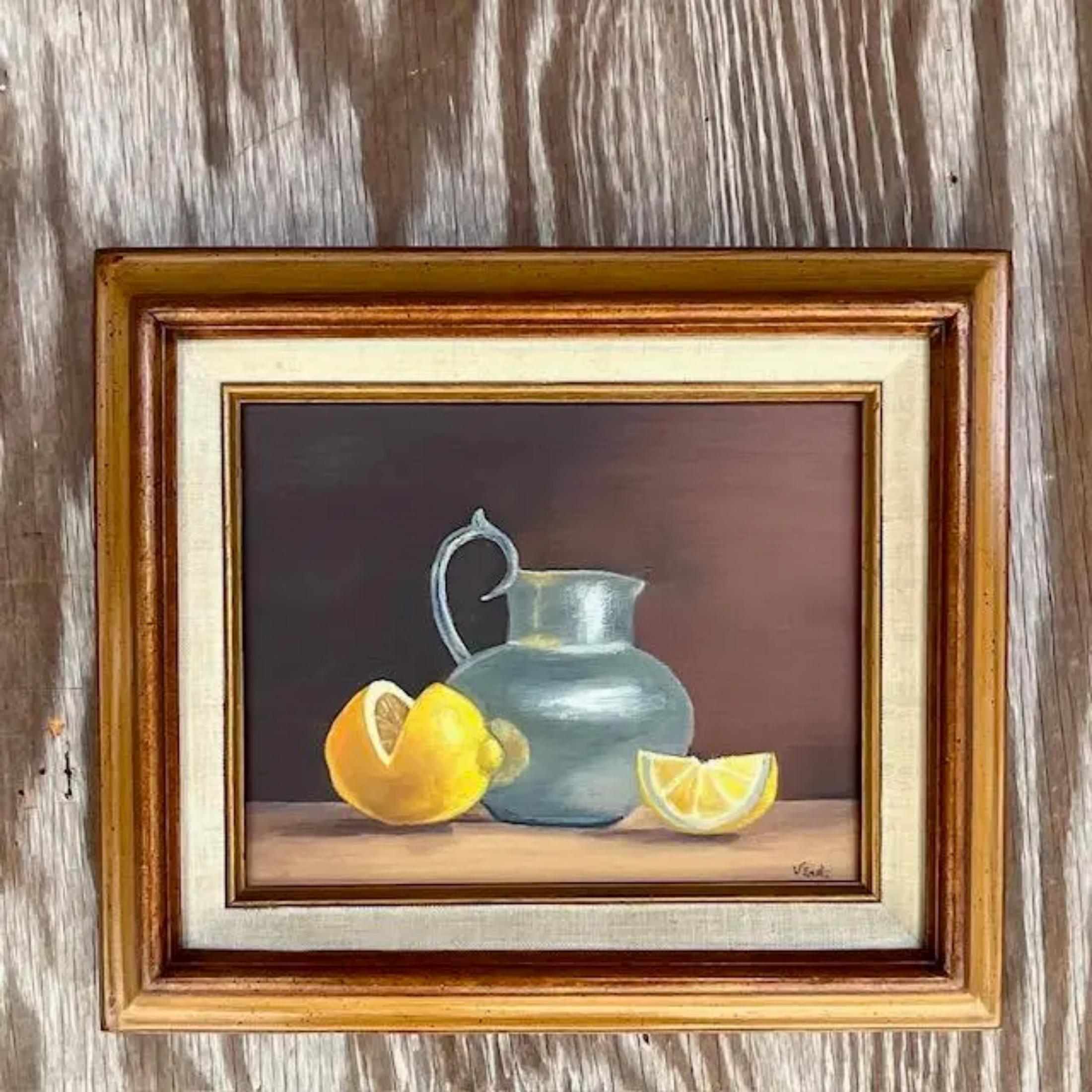 A fabulous vintage Boho original oil on canvas. A chic Still life composition of lemons and a pitched. Signed by the artist. Acquired from a Palm Beach estate.