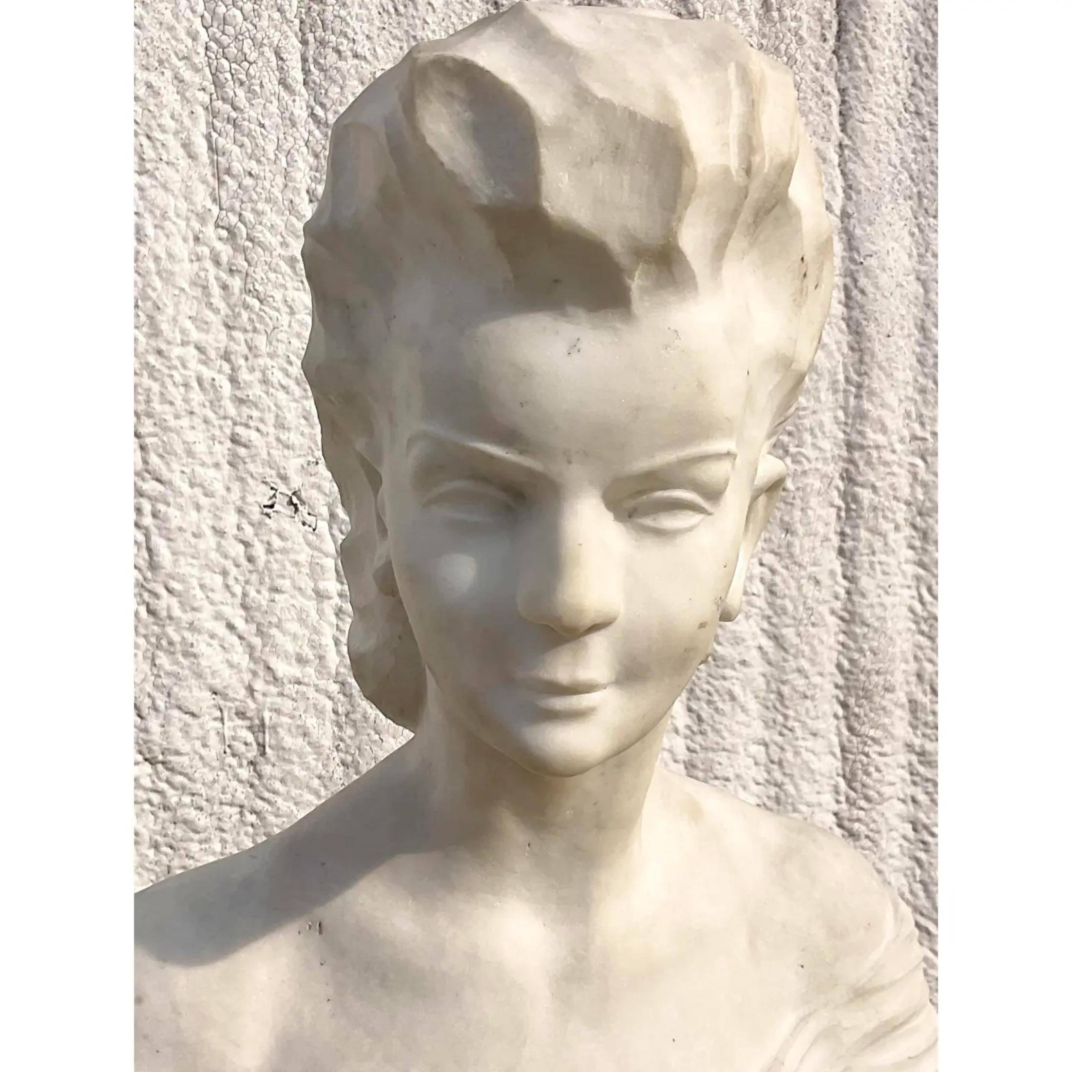 Fantastic vintage stone bust of female. A fabulous vintage woman with a decidedly contemporary look. Rests on a chic marble plinth with gorgeous veining. Acquired from a Miami estate
