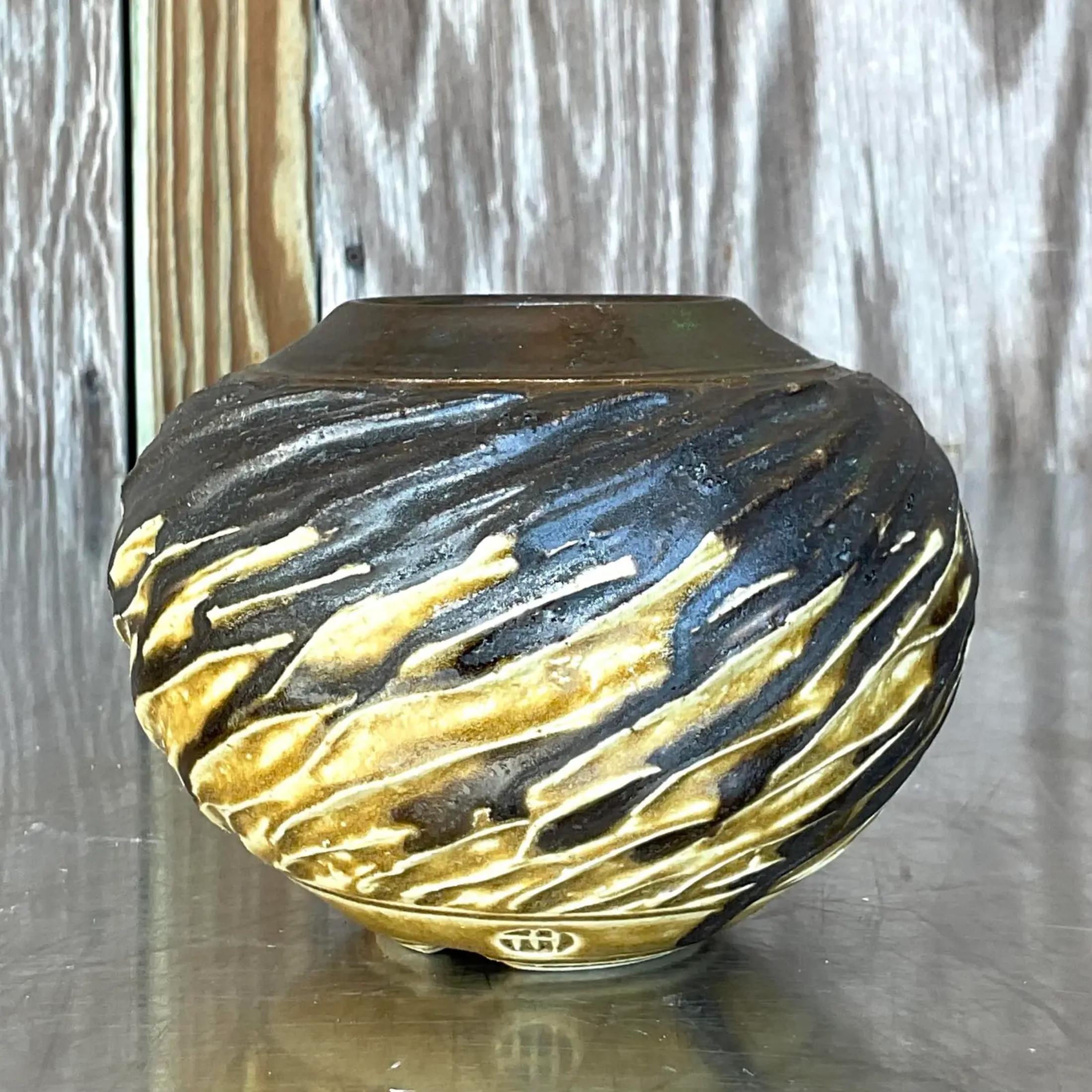 An amazing vintage Boho studio pottery vase. A chic textured piece with beautiful hand painted detail. Signed on the bottom. Acquired from a Palm Beach estate
