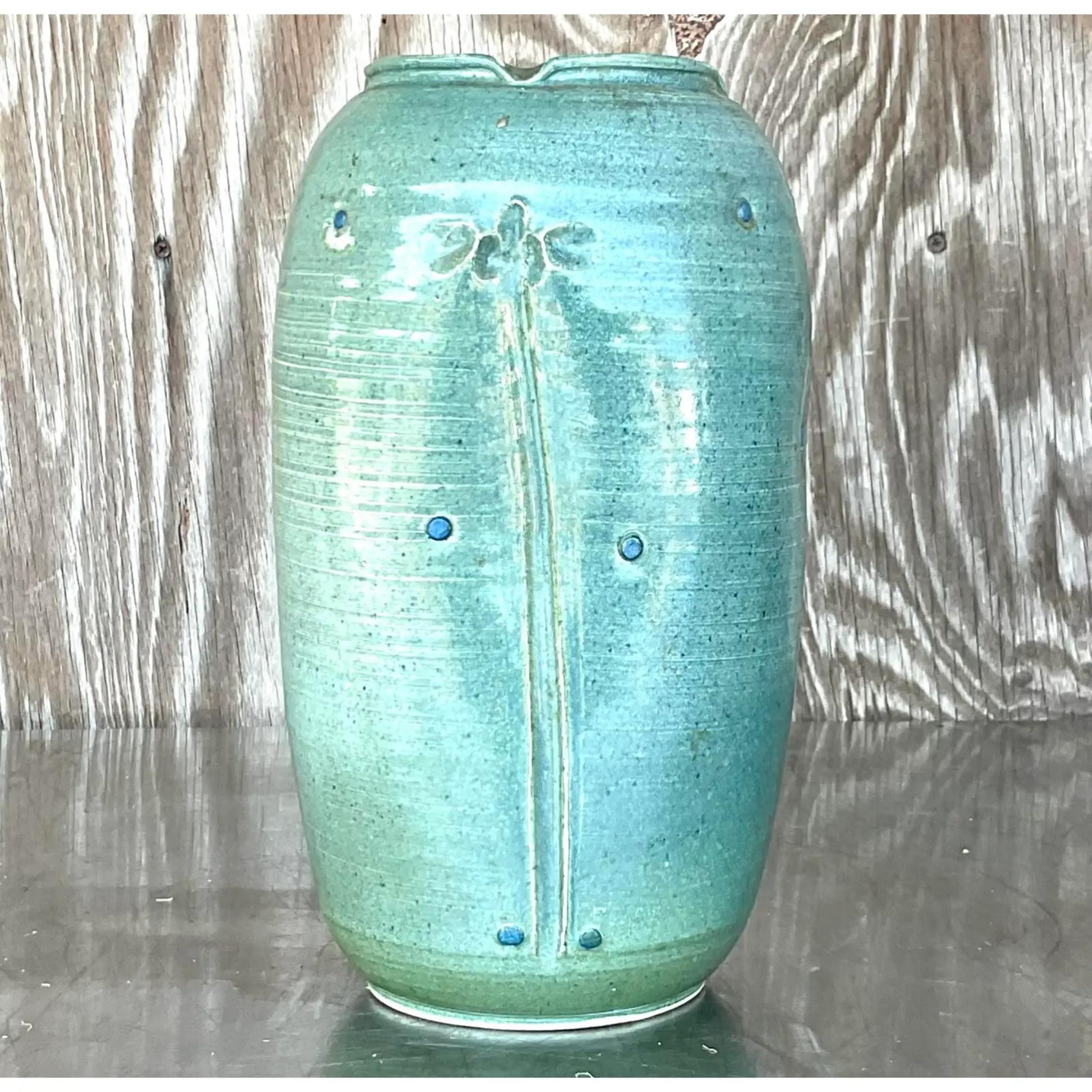 A fabulous vintage Boho studio pottery vase. A chic sea foam green color with lots of great hand wrought detail. Signed on the bottom. Acquired from a Palm a each estate