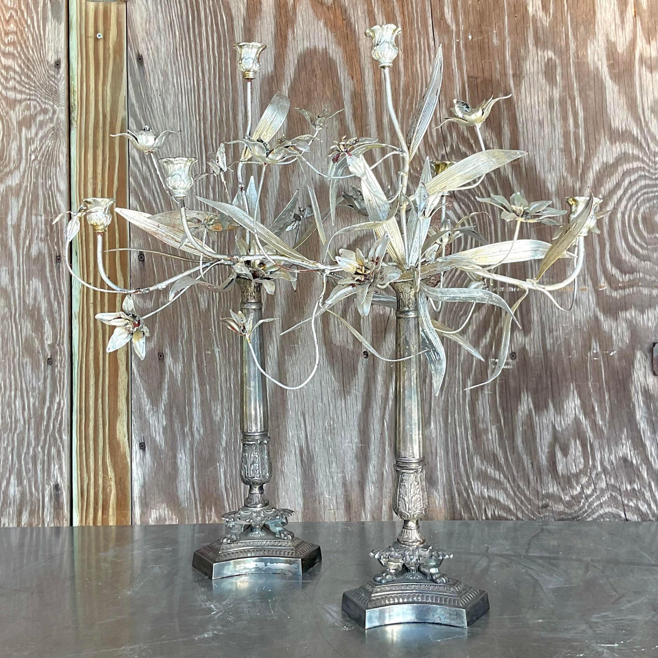 A fabulous pair of vintage Boho Candleabras. A chic silver leaf finish in a gorgeous floral design. Acquired from a Palm Beach estate.