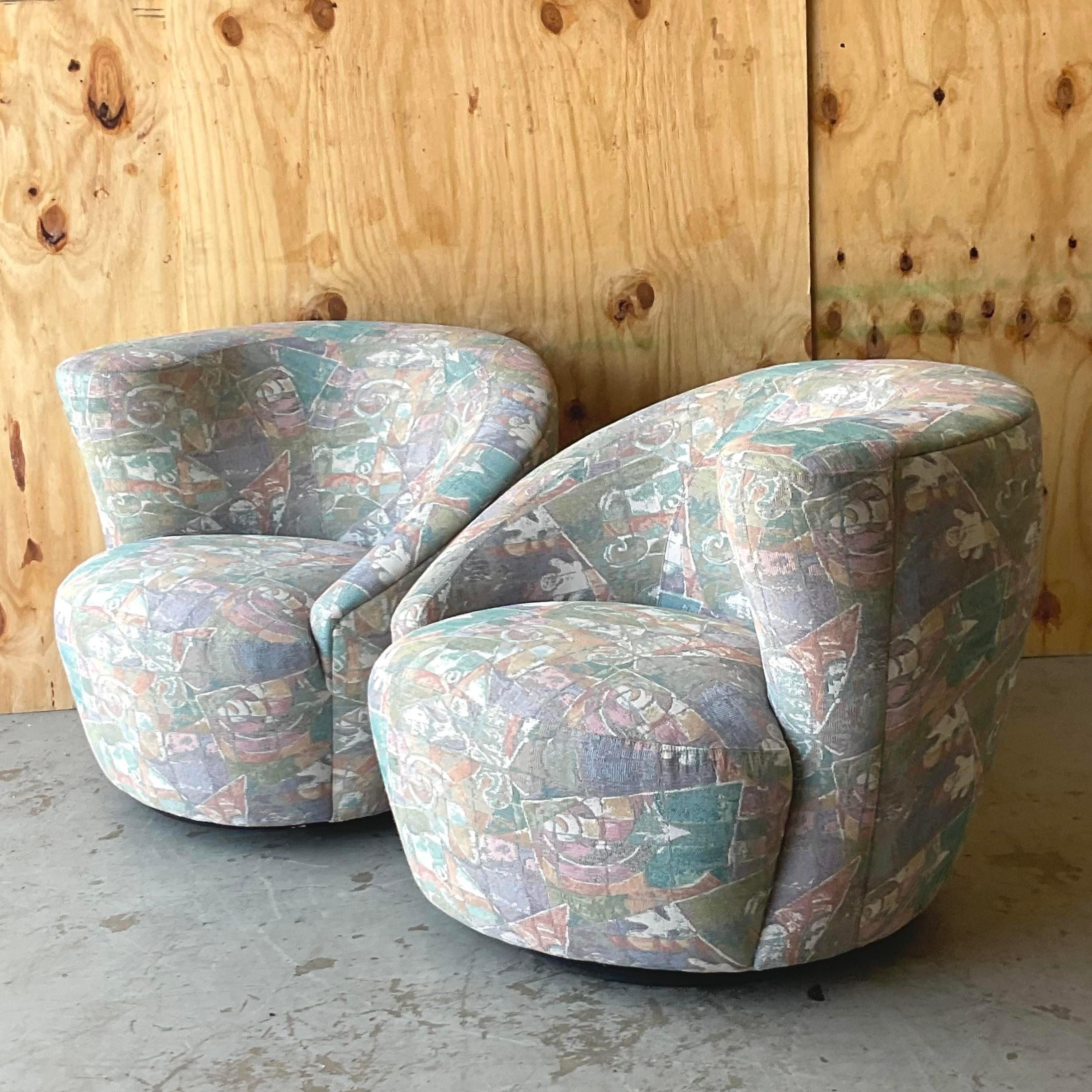 An incredible pair of vintage Boho swivel chairs. Made by the iconic Weiman group and tagged on the bottom. The coveted an auto duo shape in a pale jacquard upholstery. Two sets (four total) available on my page. Acquired from a Palm Beach estate. 