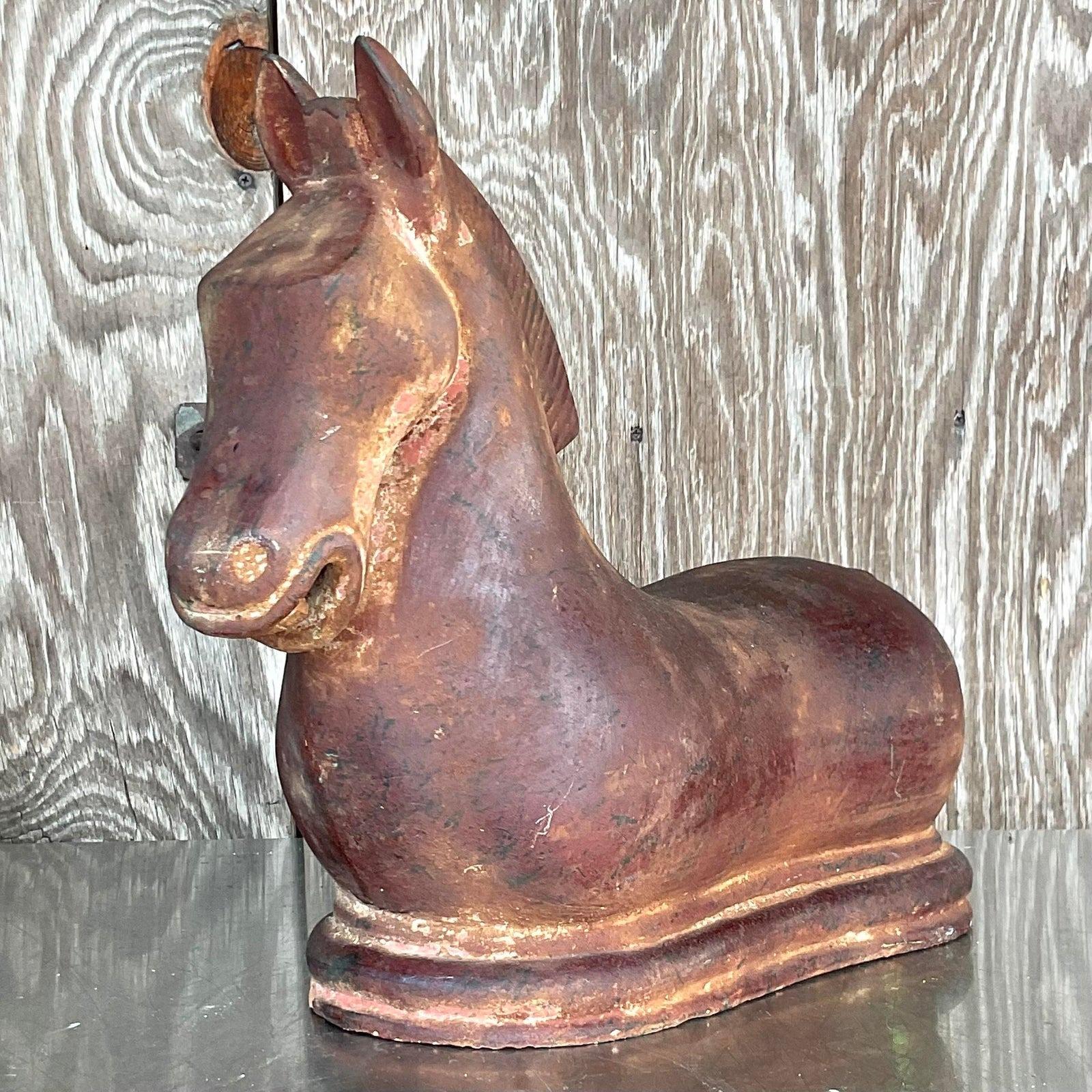A fabulous vintage Boho horse sculpture. Done in the manner of the Tang Dynasty horses. Terracotta composition with a beautiful patina from time. Acquired from a Palm Beach estate.