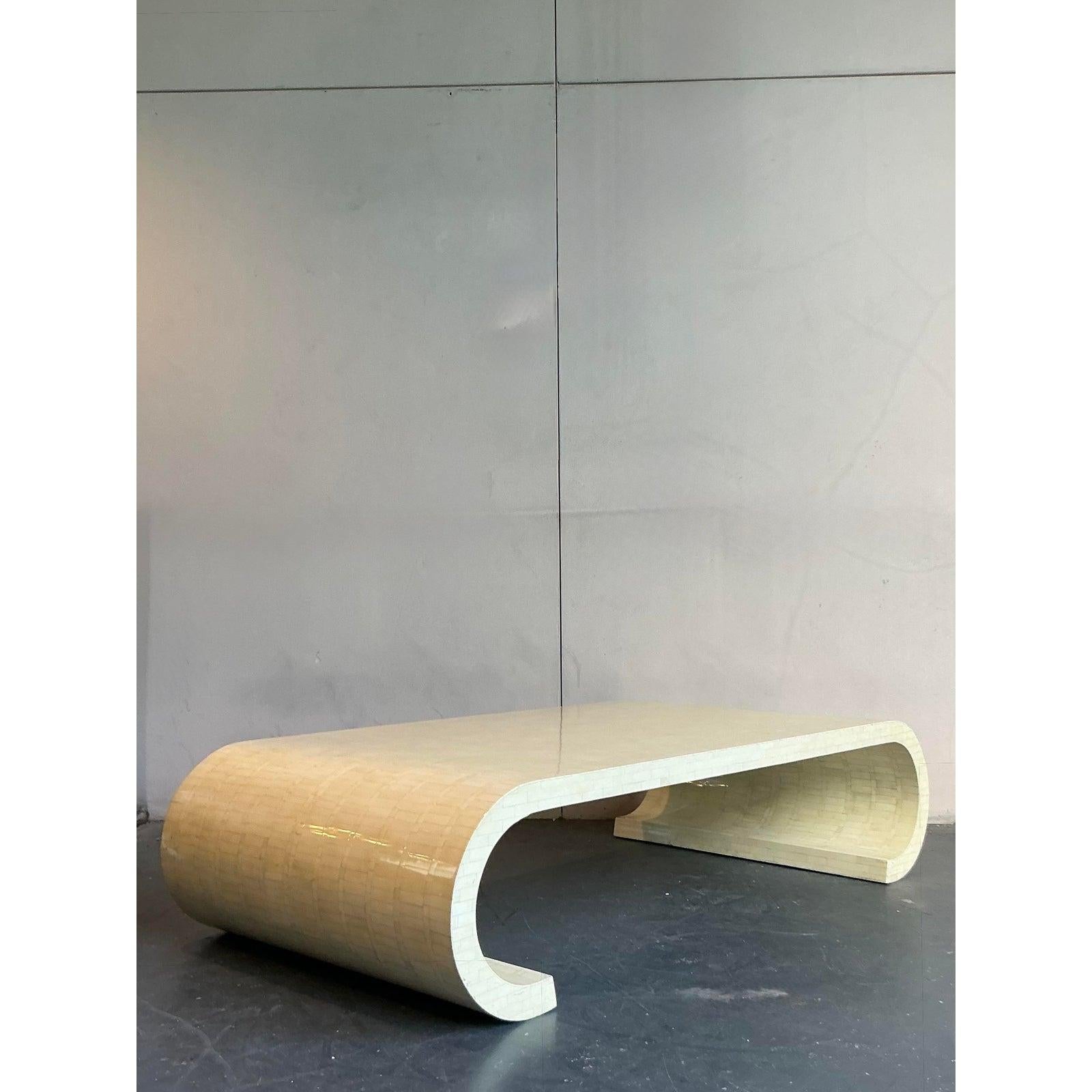 Make a truly monumental statement with this breathtaking tessellated bone coffee table, masterfully handcrafted in Colombia in the iconic style of Enrique Garcel. This stunning piece showcases the dramatic 