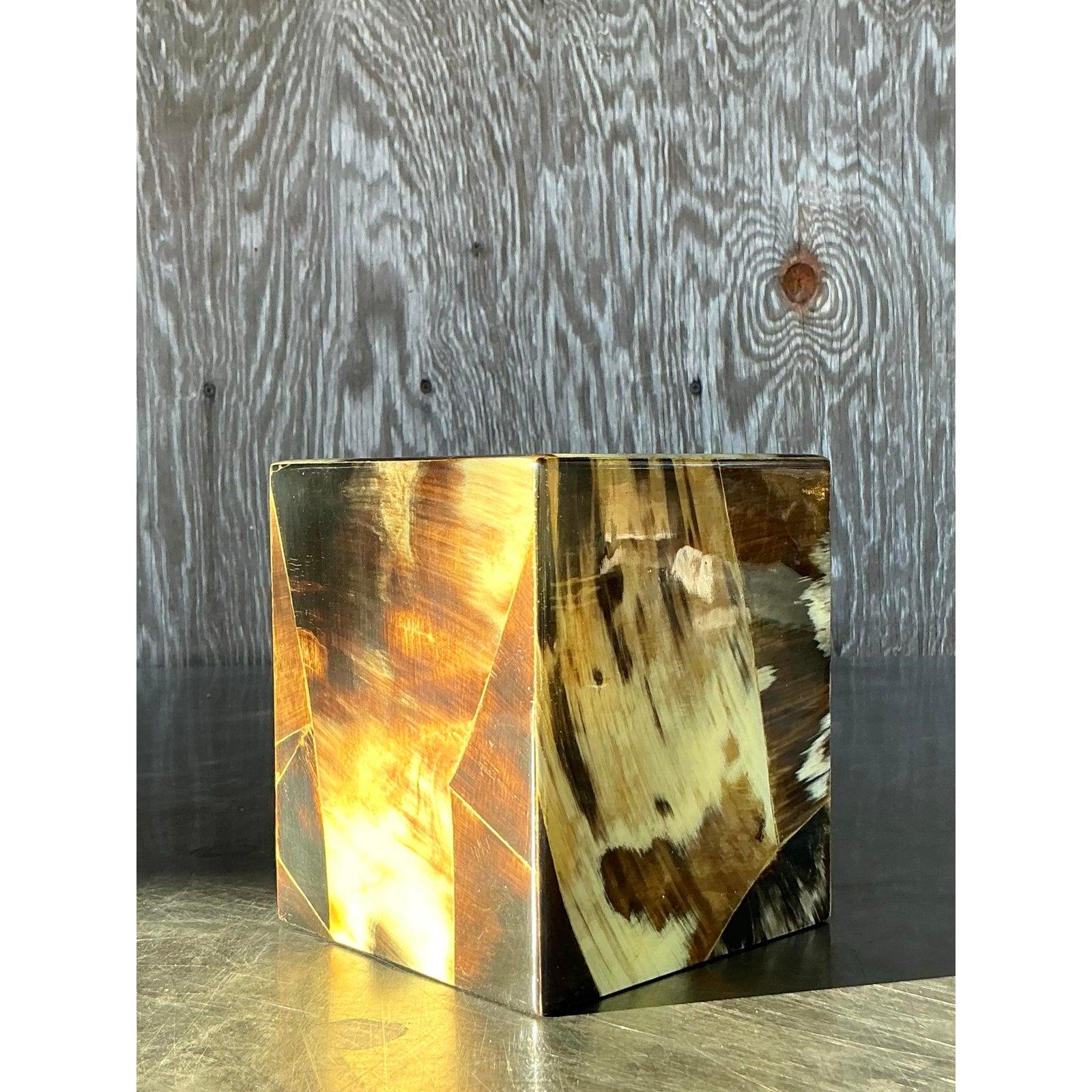 Elevate your decor with this Vintage Boho Tessellated Horn Tissue Box Cover, a luxurious accessory that combines natural beauty with artisanal craftsmanship. Crafted from intricately tessellated horn, this piece showcases a stunning interplay of