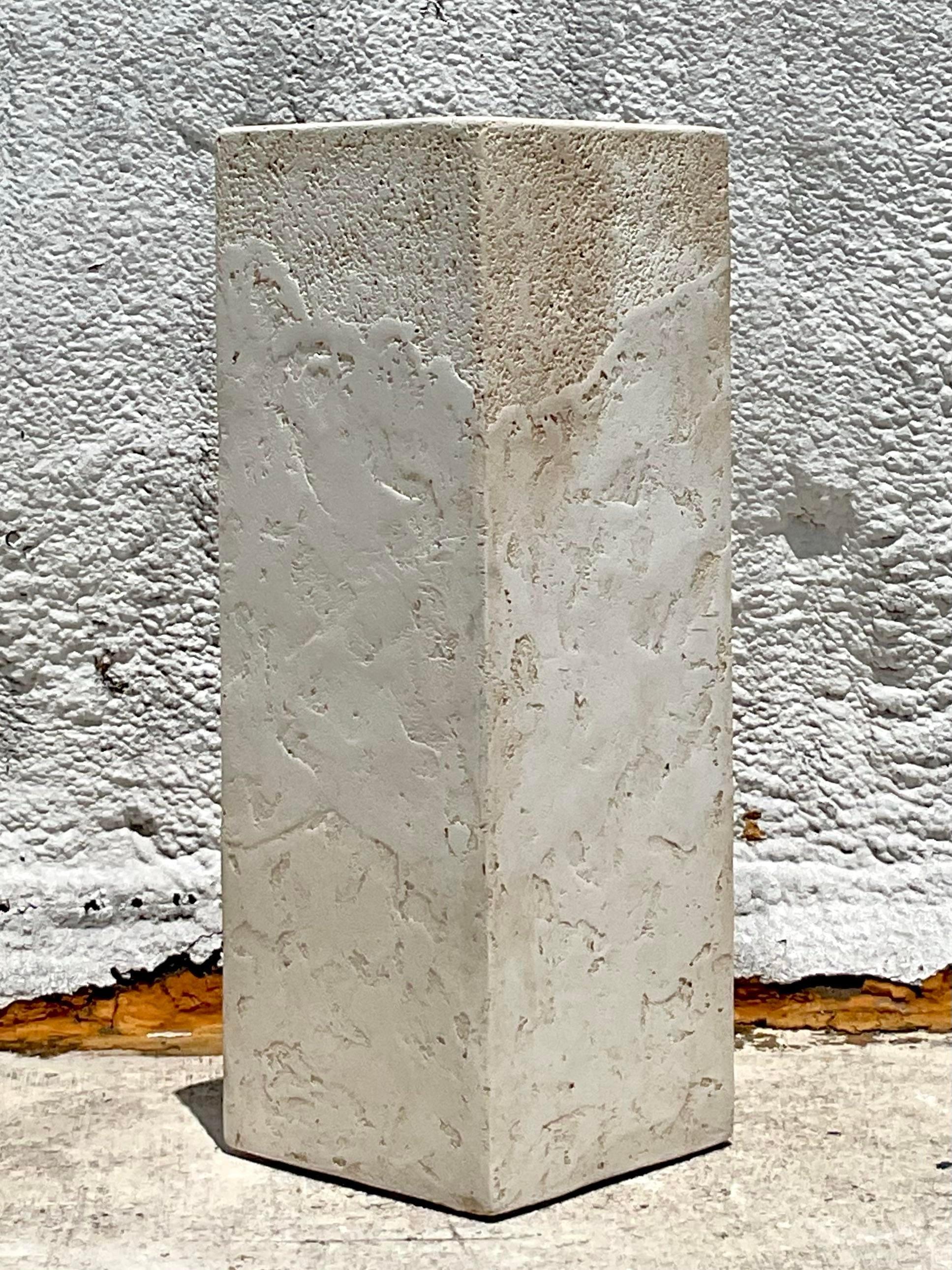Elevate your decor with the Vintage Boho Textured Plaster Pedestal. This American-style piece features intricate textured plaster, blending bohemian charm with classic elegance, perfect for showcasing your favorite art or plants.