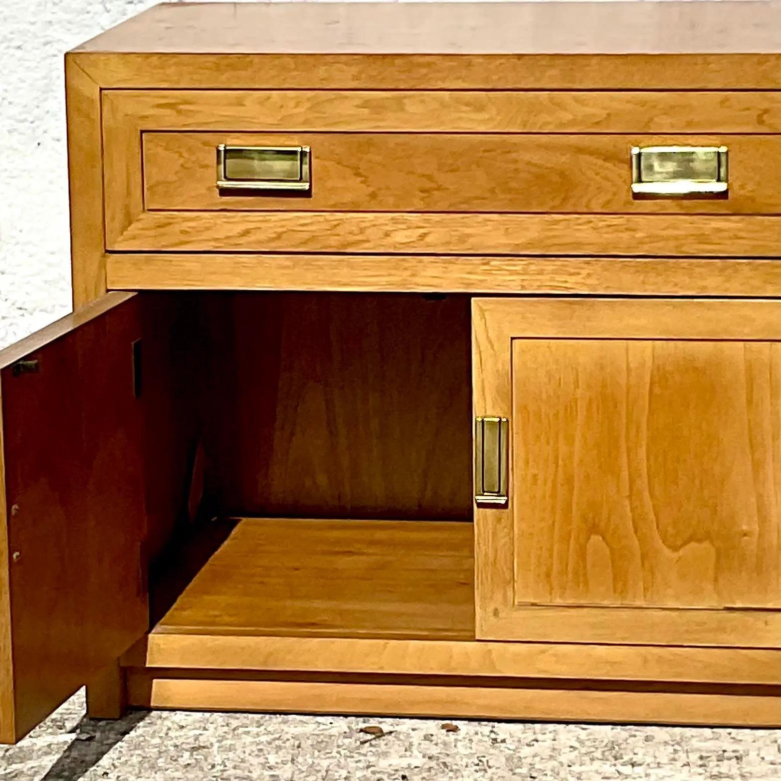 A fantastic pair of vintage Boho nightstands. Beautiful warm wood with brass hardware. Made by the Thomasville group and tagged on the inside drawer. Acquired from a Palm Beach estate.