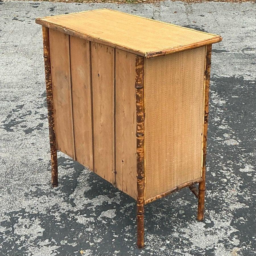 Bring natural elegance to your space with this vintage boho tortoise bamboo chest of drawers. Featuring a beautifully textured bamboo frame with a warm, tortoise shell-inspired finish, this chest combines organic charm with functional storage. Its