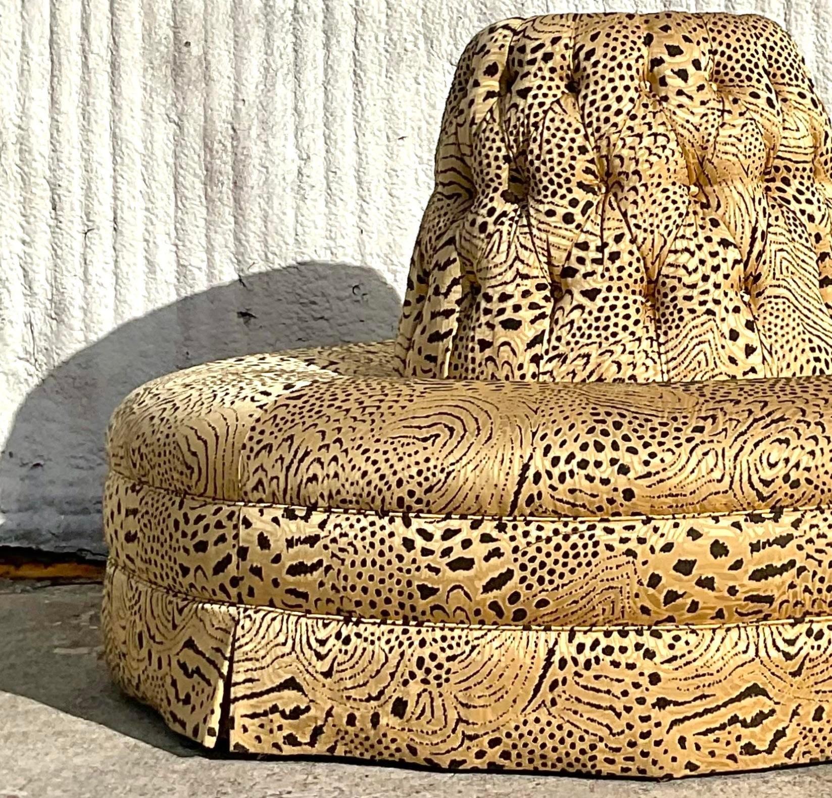 A stunning vintage Boho settee. The iconic Bourne settee in a chic animal print jacquard. Tufted center column. Acquired from a Palm Beach estate.