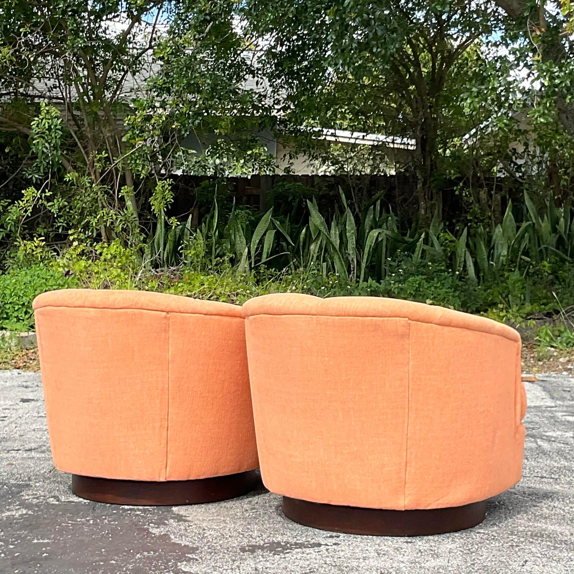 Iconic Boho Flair: Vintage Tufted Swivel Chairs Inspired by Milo Baughman - A Pair. Infuse your space with American ingenuity and bohemian charm, featuring timeless design and comfortable functionality for a statement seating arrangement 