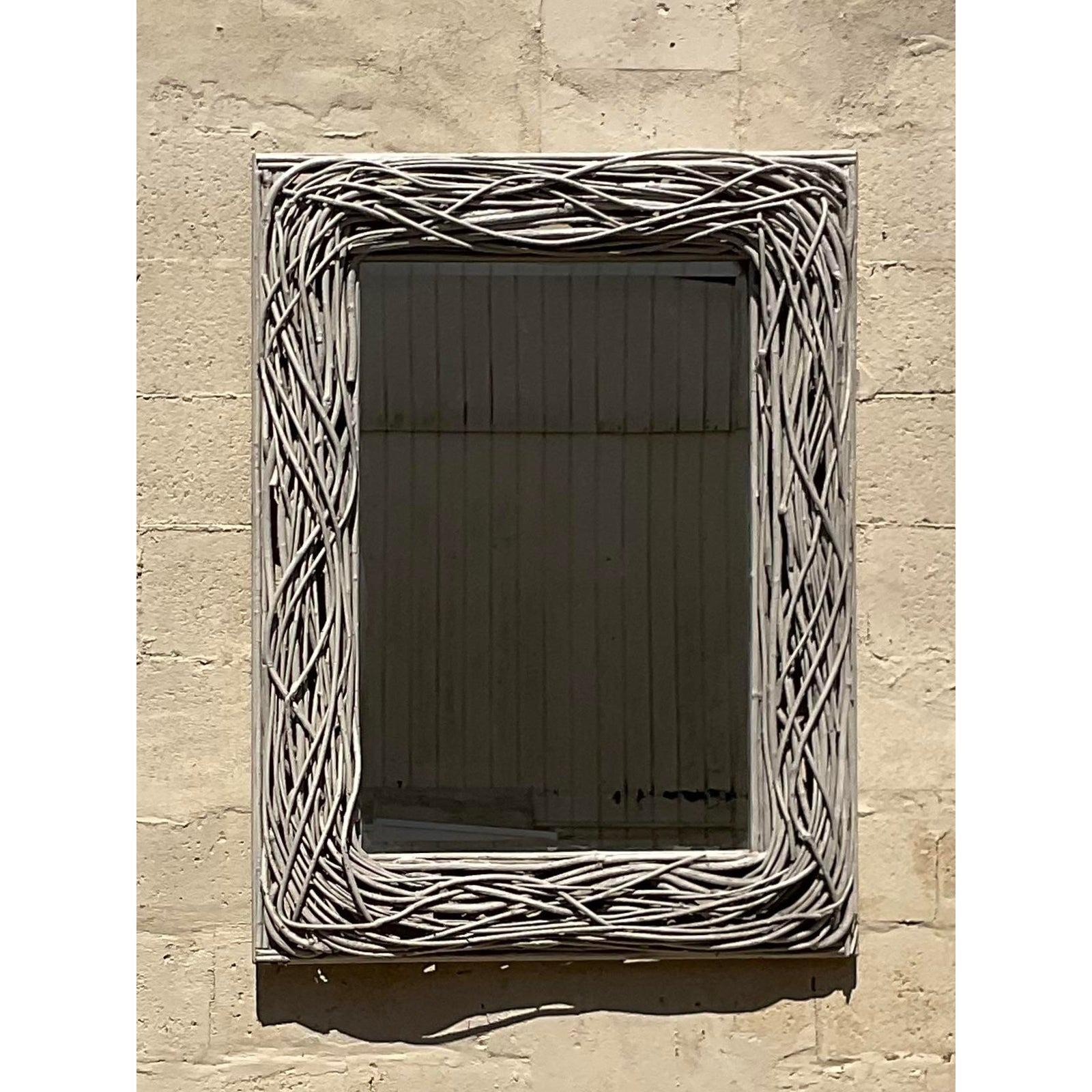 Vintage Boho Rustic mirror. A chic series of woven twigs in a pale grey finish. Acquired from a Palm Beach estate.