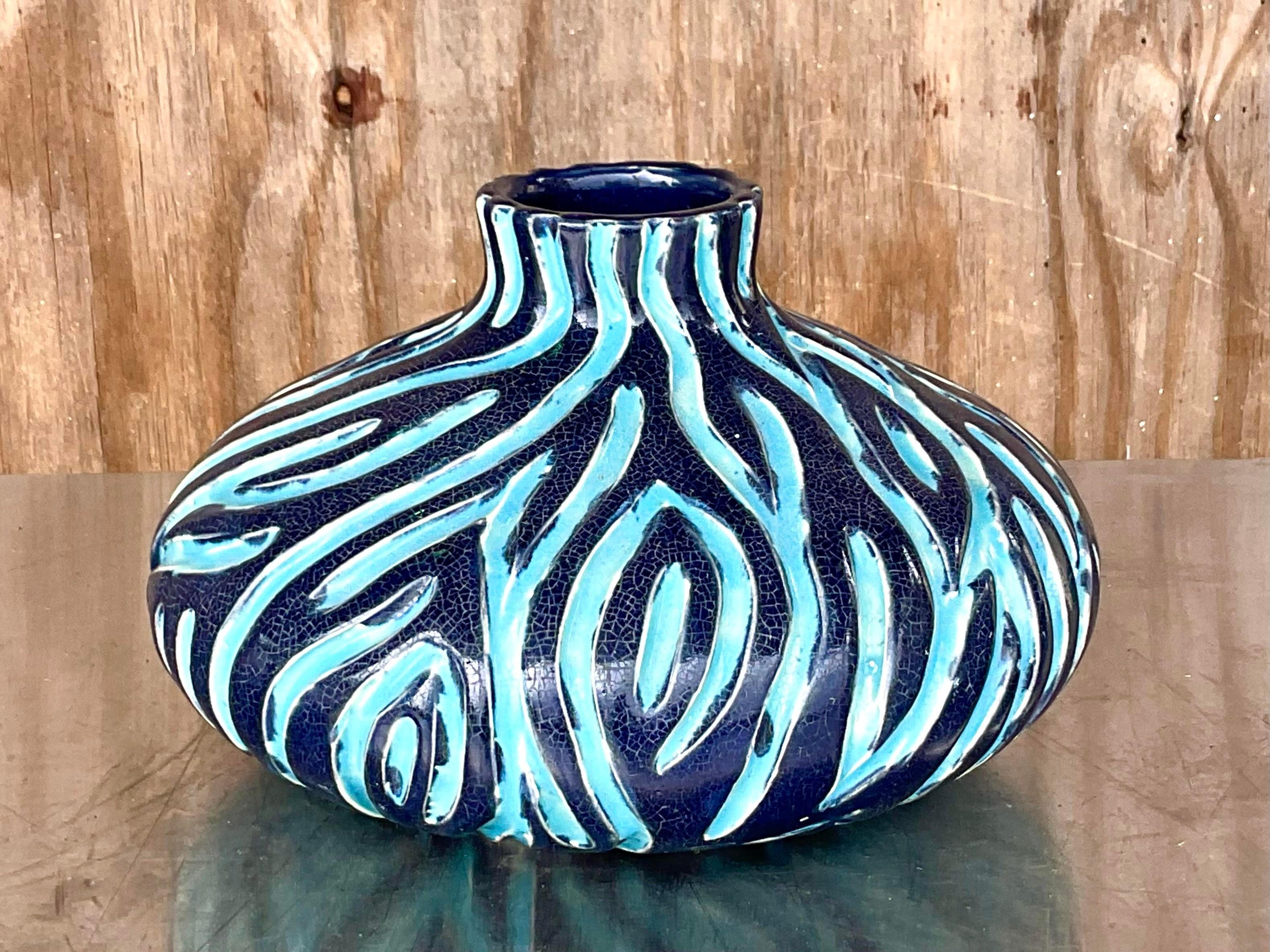 Fantastic vintage hand thrown navy pottery vase. Beautiful wiggle lines reveal a bright blue line. Acquired from a Palm Beach estate. 