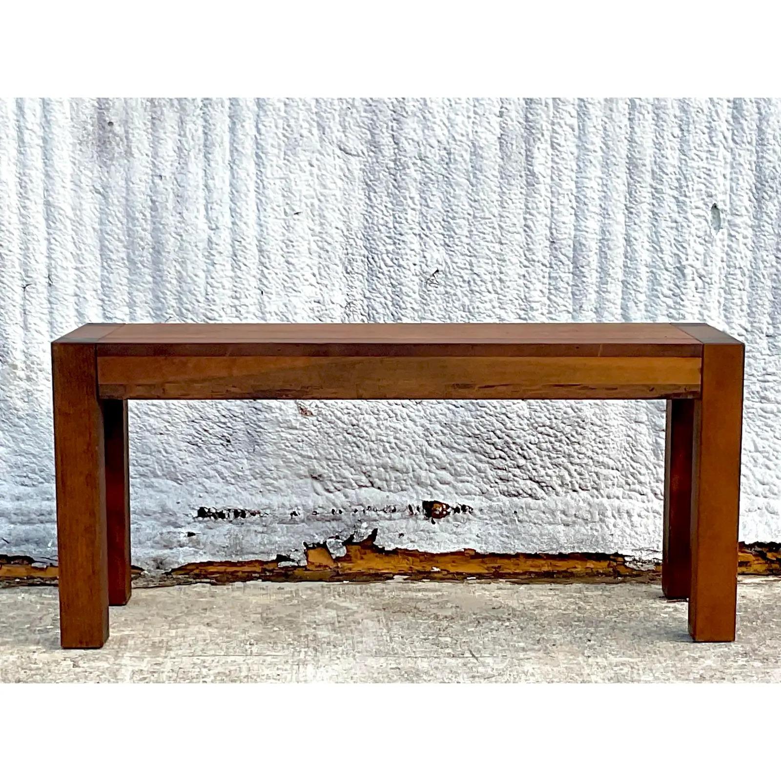 A fantastic vintage Boho console table. Beautiful block wood construction in a chic Parsons style. Great wood grain detail. A solid piece of furniture. Acquired from a Palm Beach estate.