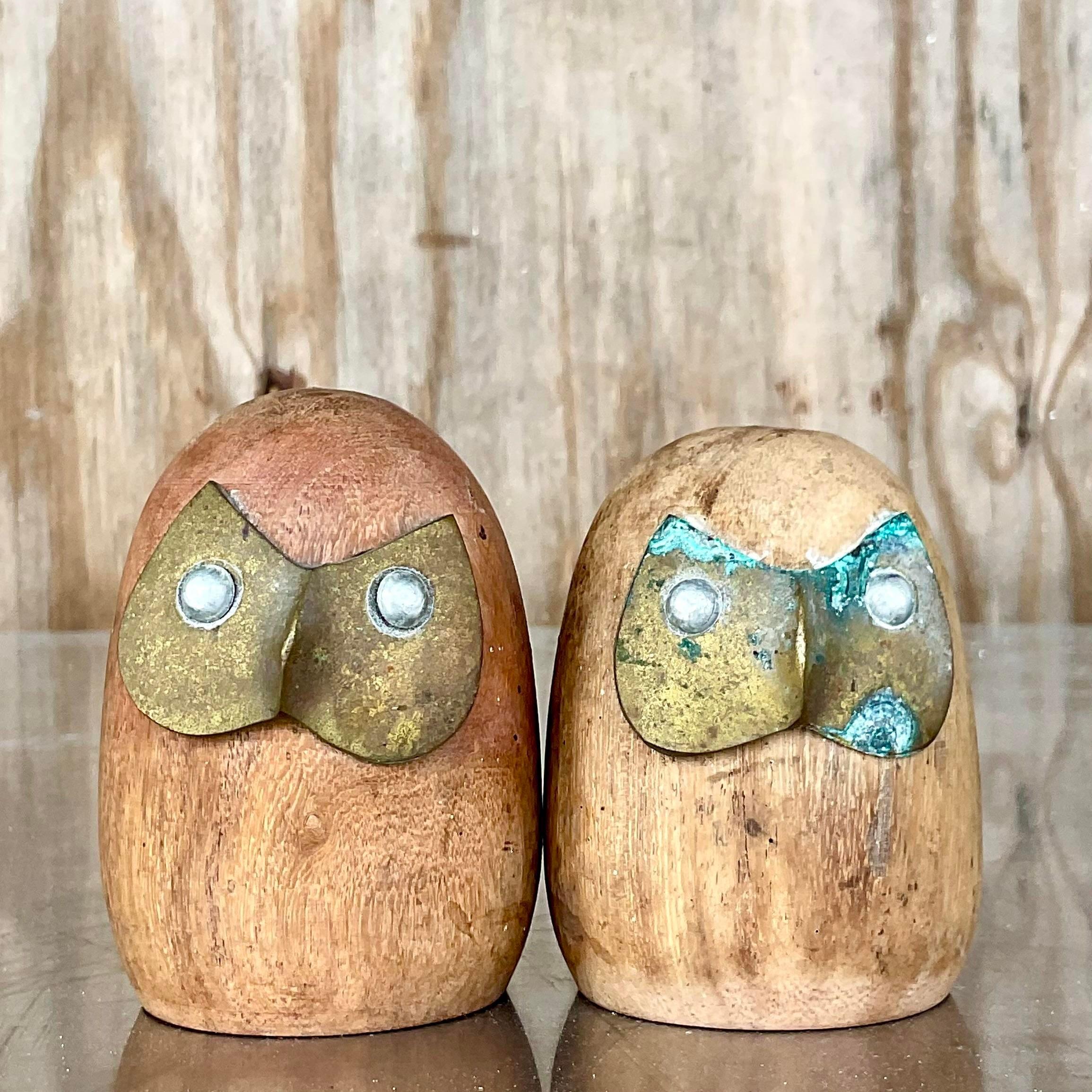 A fantastic pair of vintage owl figurines. Super charming pair of wood birds with great patina from time. Acquired from a Palm Beach estate. 