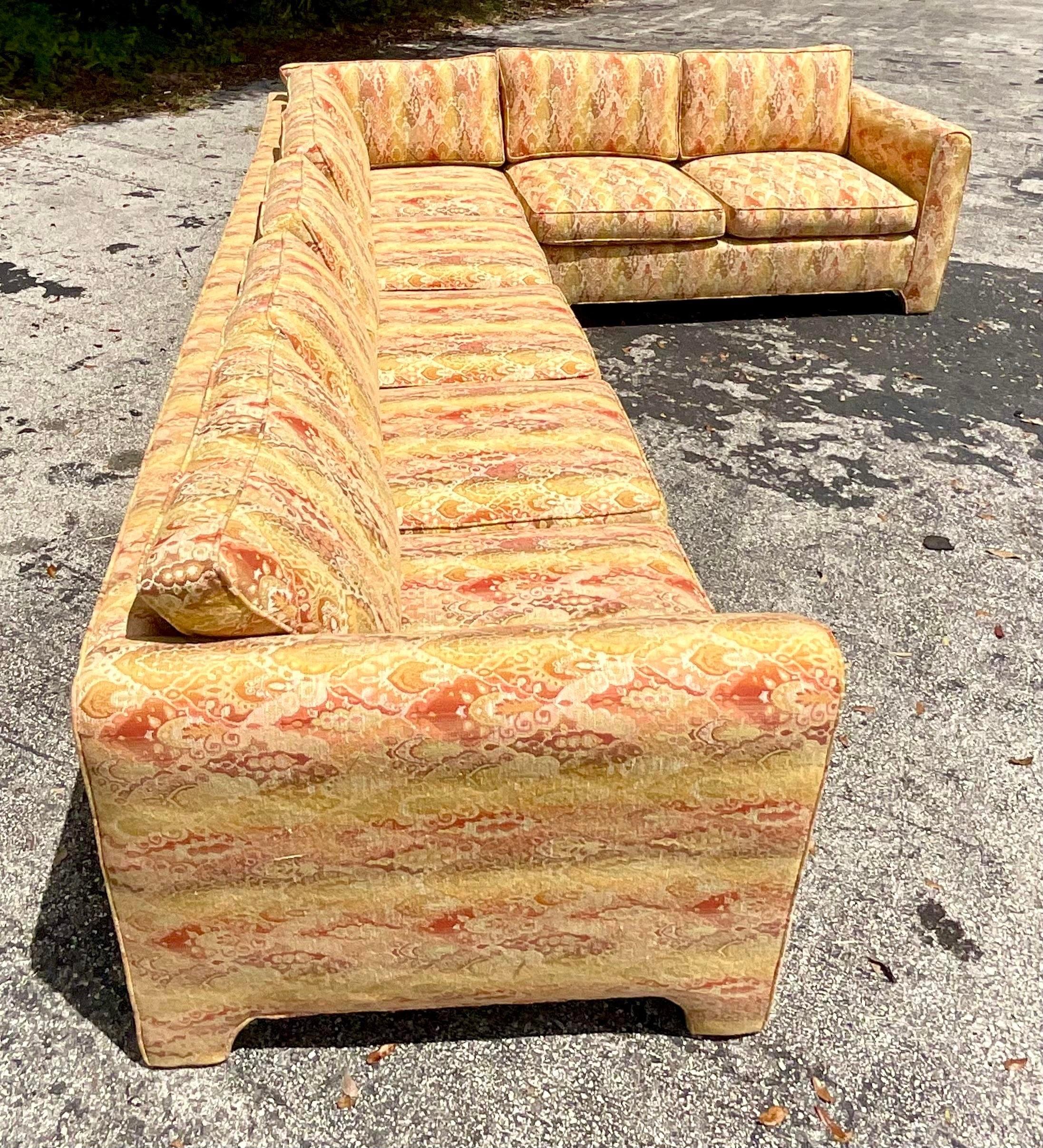 An incredible vintage Boho sectional sofa. A gorgeous woven jacquard in gorgeous rich colors. Three sections make up this great parsons style design. Acquired from a Palm Beach estate.

Long section 97.5
Corner piece 34.5x34.5
Short section 61