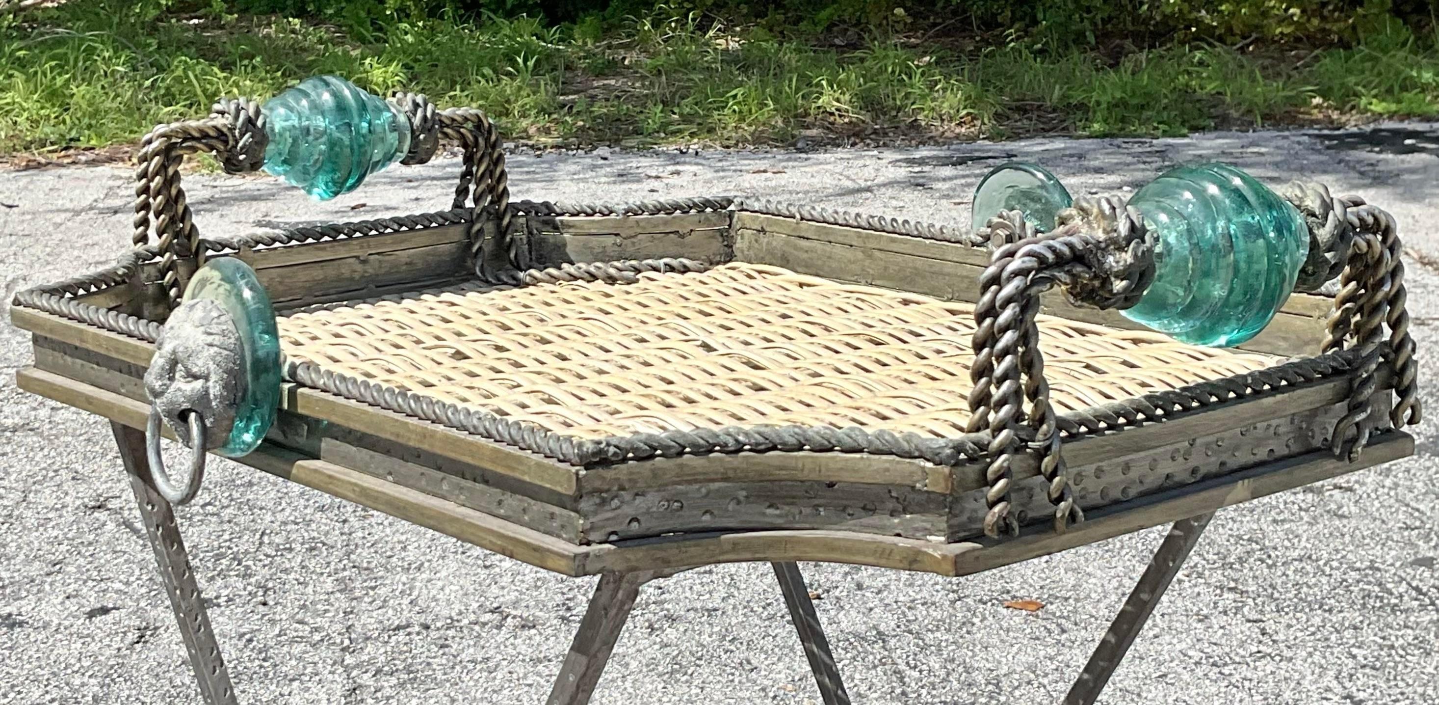 Add a touch of natural elegance to your home with this Vintage Boho Woven Rattan and Glass Tray. This beautifully handcrafted tray features an intricately woven rattan base, exuding a warm, earthy charm that pairs perfectly with bohemian and