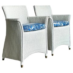 Pareja de tumbonas vintage de ratán tejido boho con motivos florales Meg Braff