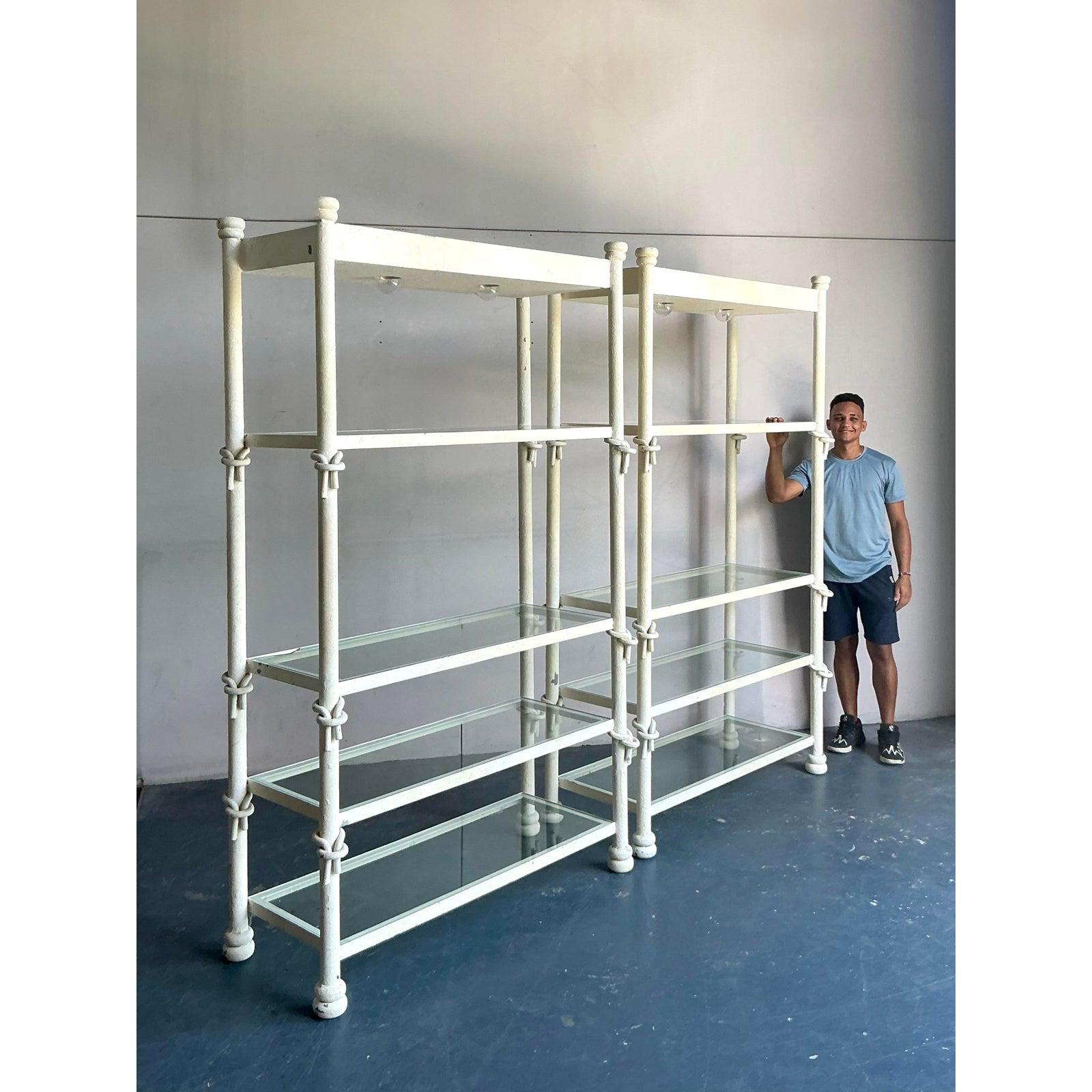 Presenting a captivating pair of vintage wrought iron etageres, exuding an irresistible Boho aesthetic with their distinctive knot detailing. These striking pieces feature robust wrought iron frames, meticulously crafted with charming decorative