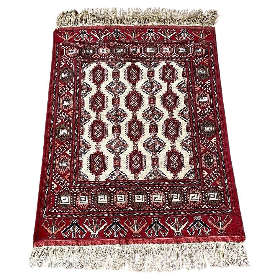Vintage Bokhara Wool Rug – Hand-Knotted Turkmen Design in Red & Ivory