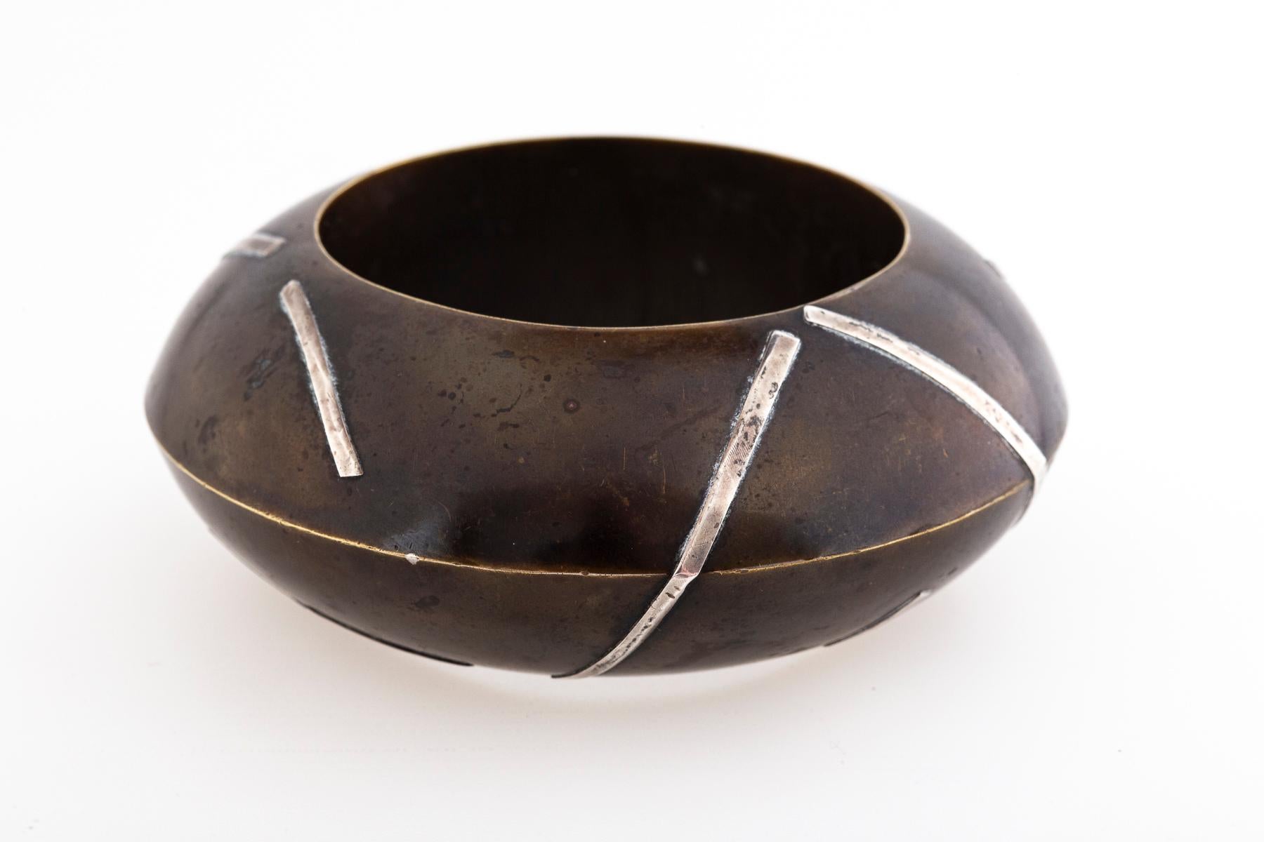 Lightening strikes with this Iris Apfel worthy, brass and silver cuff with lightening strokes artisan made in the US circa 1970-80. The cuff looks like an artist's sculpture. This is a heavy piece. I will note the exact size and weight when it