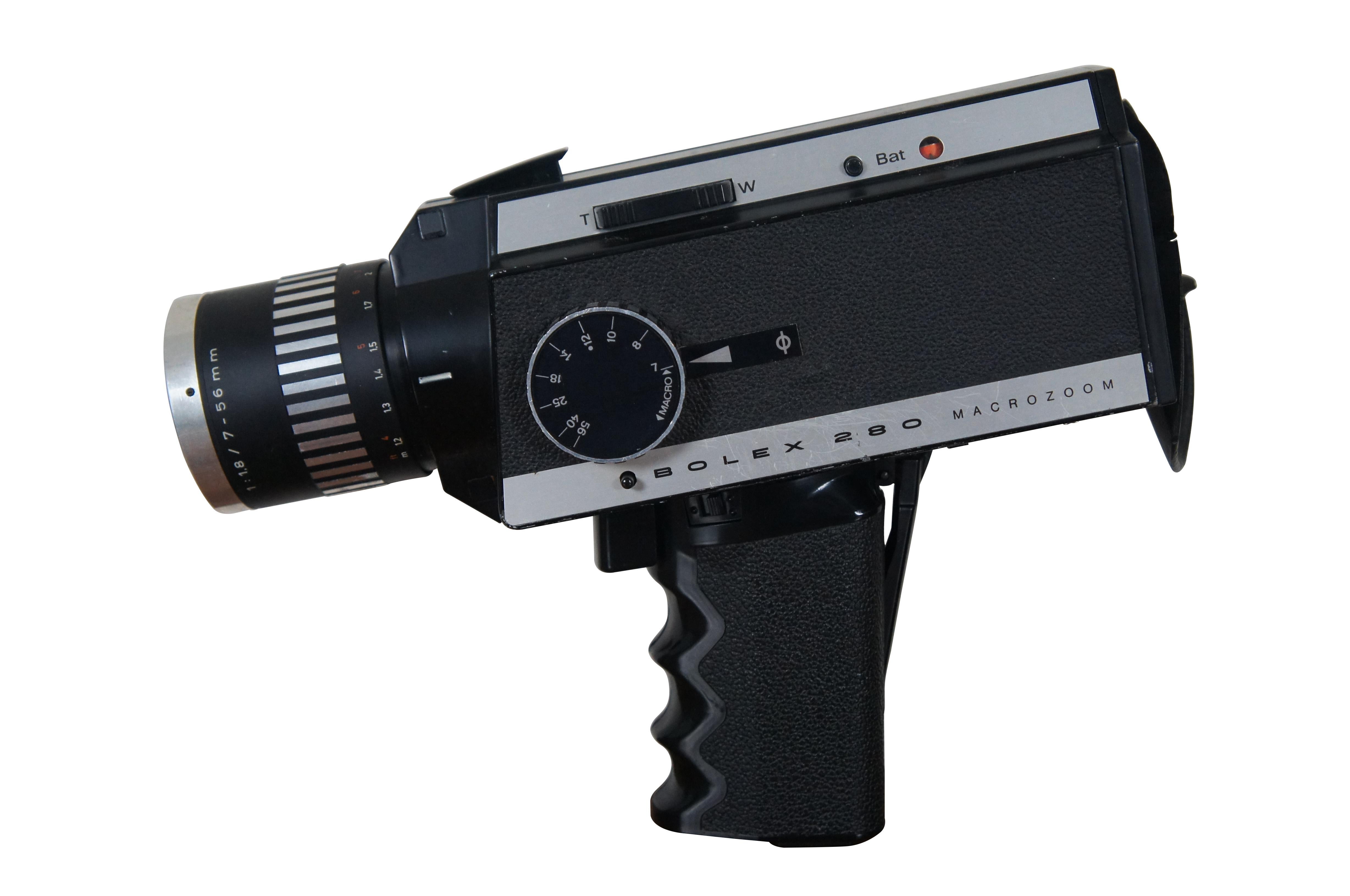 Vintage Bolex 280 Macrozoom video camera and case.  Includes camera strap, remote shutter button, lens cap, rubber lens hood, and camera strap.  Made in Austria.

Dimensions:
Case - 11.25” x 4” x 8.5” / Camera - 9.75” x 3” x 7.5” (Width x Depth x