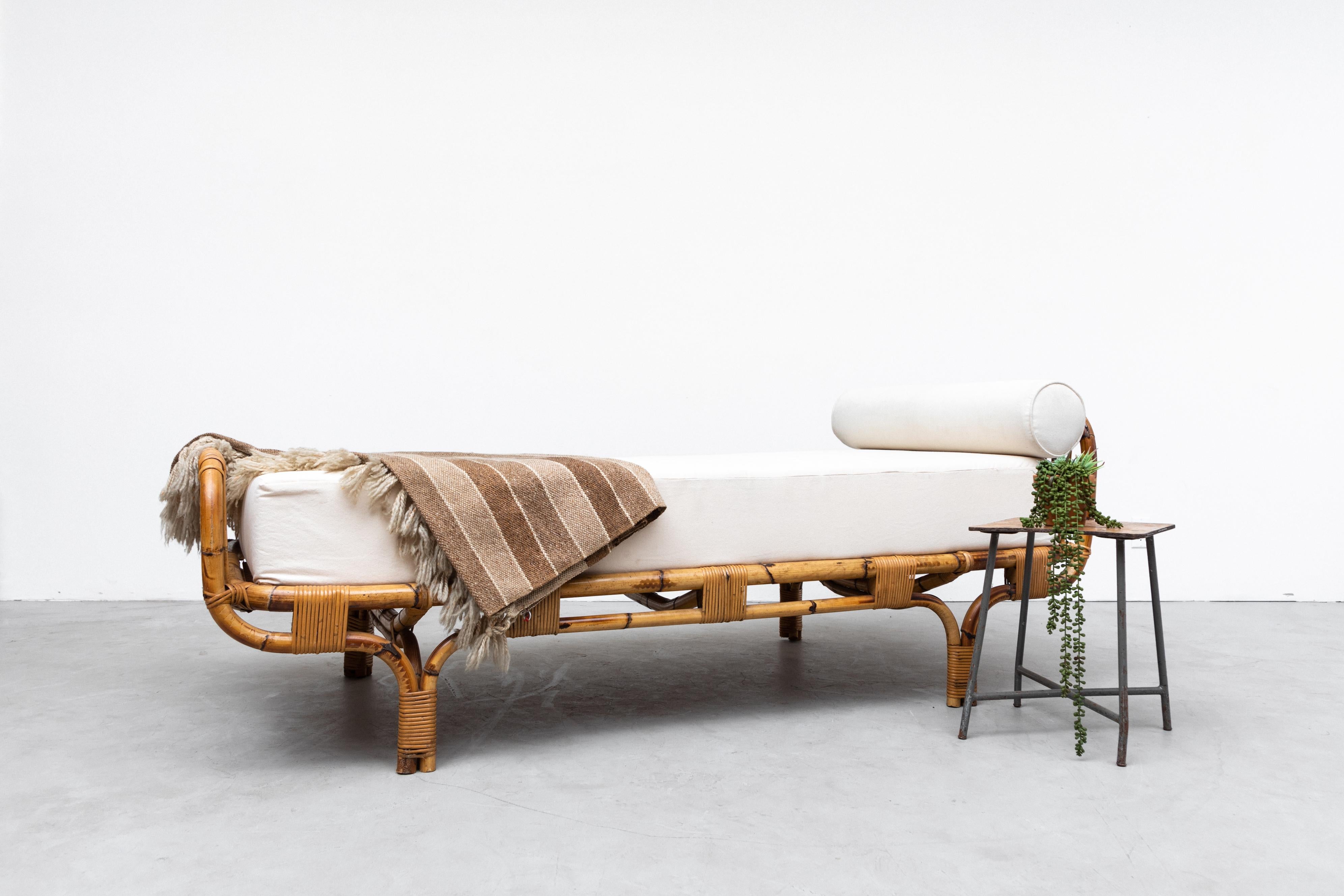 Tito Agnoli attributed bamboo daybed for Bonacina. In original condition with some wear consistent with age and use. Inside measurements are 31.25